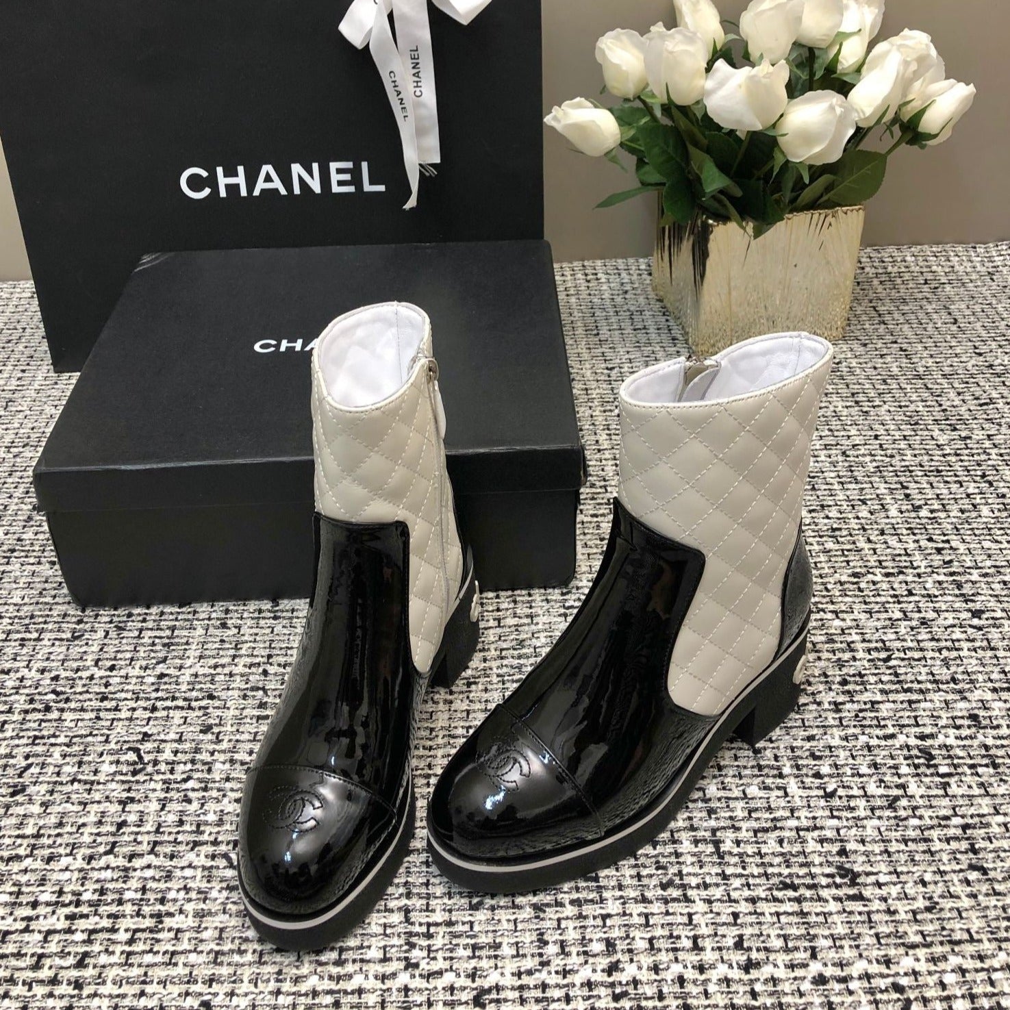 CHANEL ROUND-TOE SHORT BOOTS BLACK MIX WHITE SHEEPSKIN