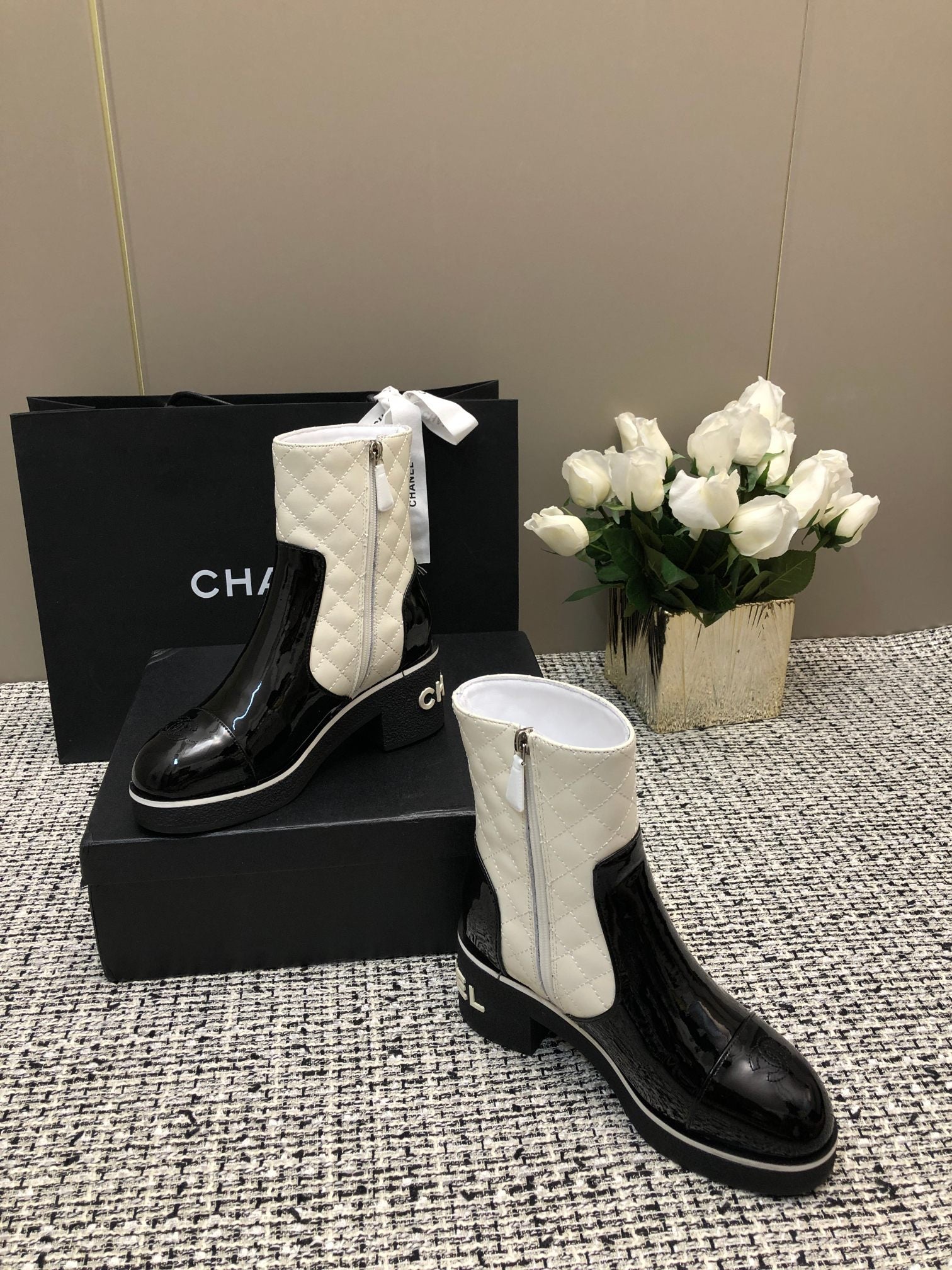 CHANEL ROUND-TOE SHORT BOOTS BLACK MIX WHITE SHEEPSKIN