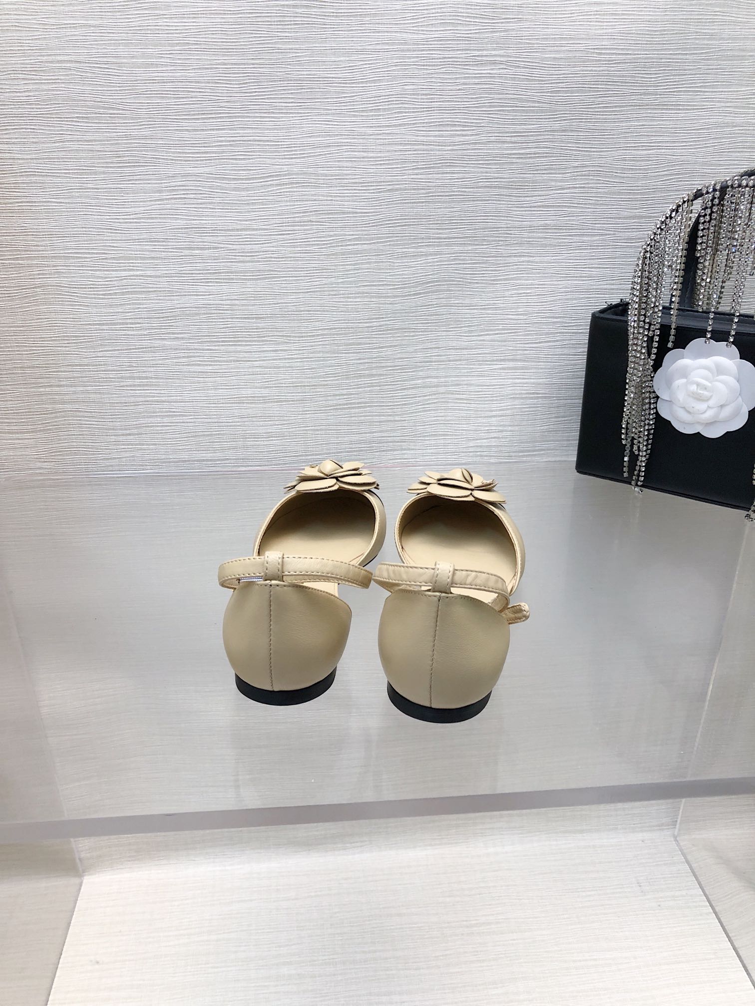 CHANEL BEIGE MIX BLACK LAMBSKIN CAMELLIA HOLLOW SANDAL