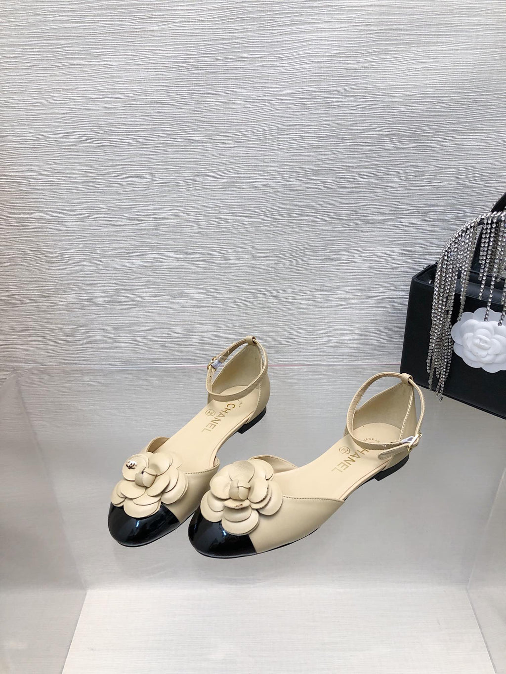 CHANEL BEIGE MIX BLACK LAMBSKIN CAMELLIA HOLLOW SANDAL