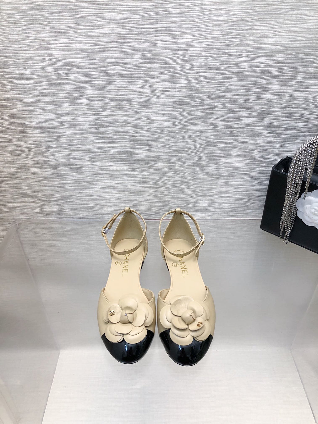 CHANEL BEIGE MIX BLACK LAMBSKIN CAMELLIA HOLLOW SANDAL