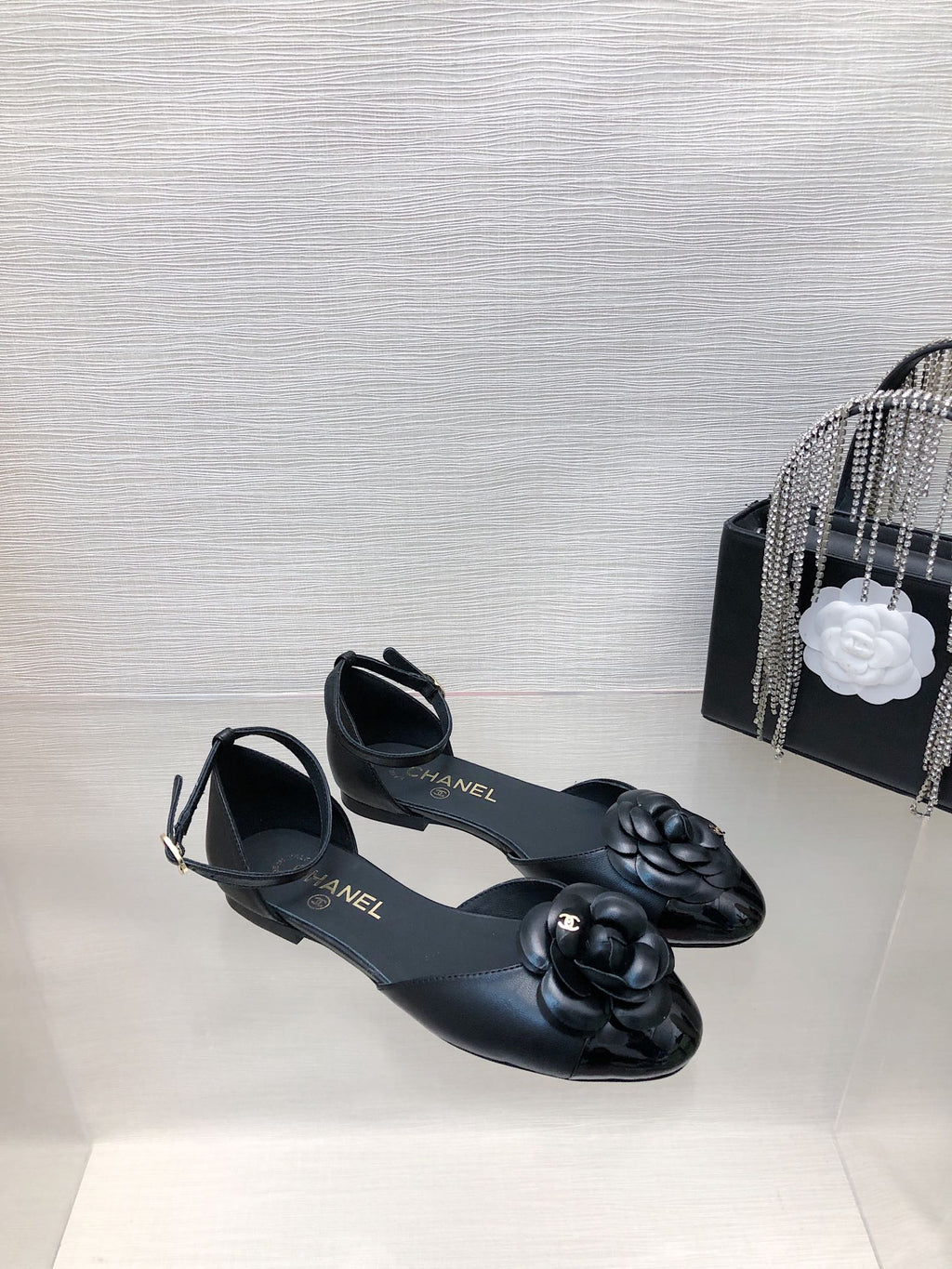 CHANEL BLACK LAMBSKIN CAMELLIA HOLLOW SANDAL