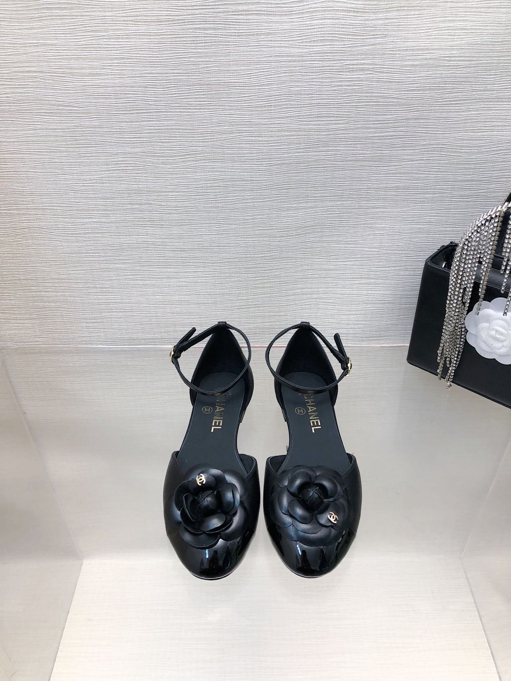 CHANEL BLACK LAMBSKIN CAMELLIA HOLLOW SANDAL