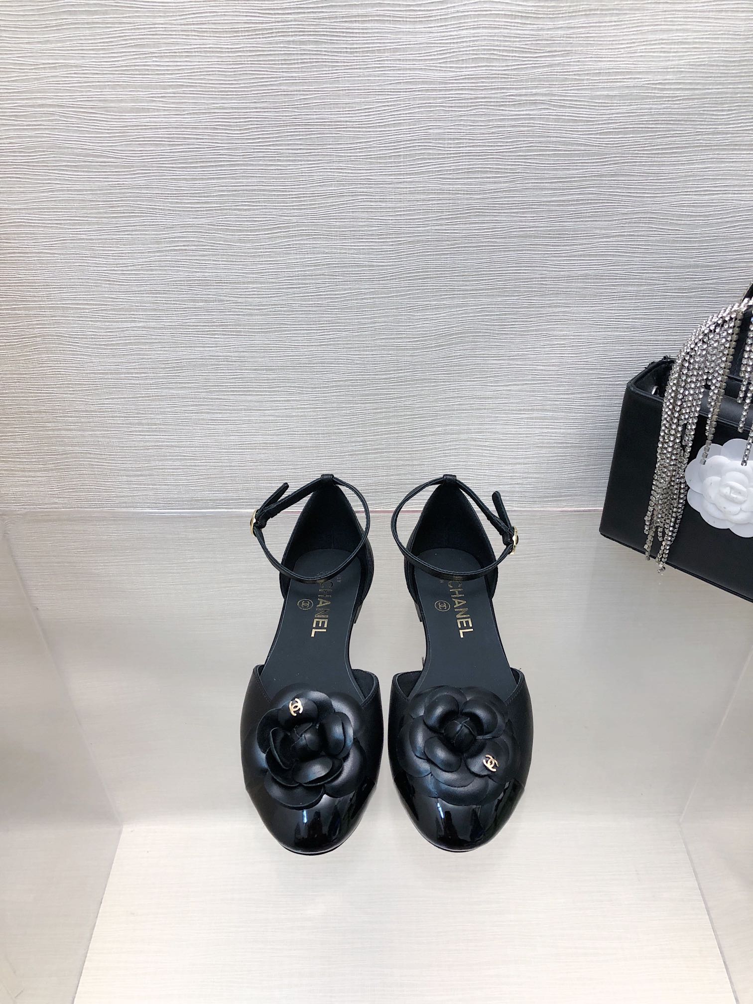 CHANEL BLACK LAMBSKIN CAMELLIA HOLLOW SANDAL