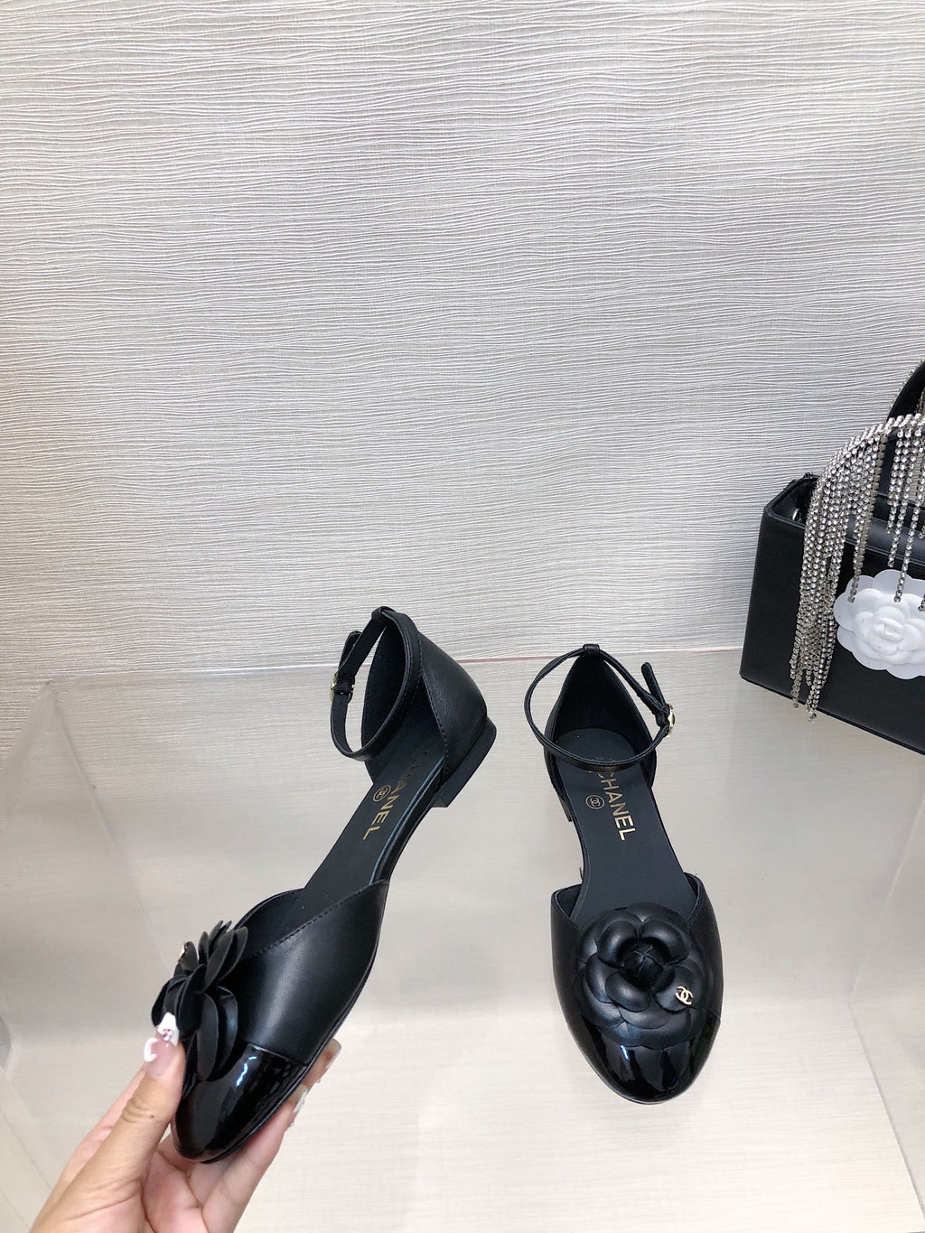 CHANEL BLACK LAMBSKIN CAMELLIA HOLLOW SANDAL