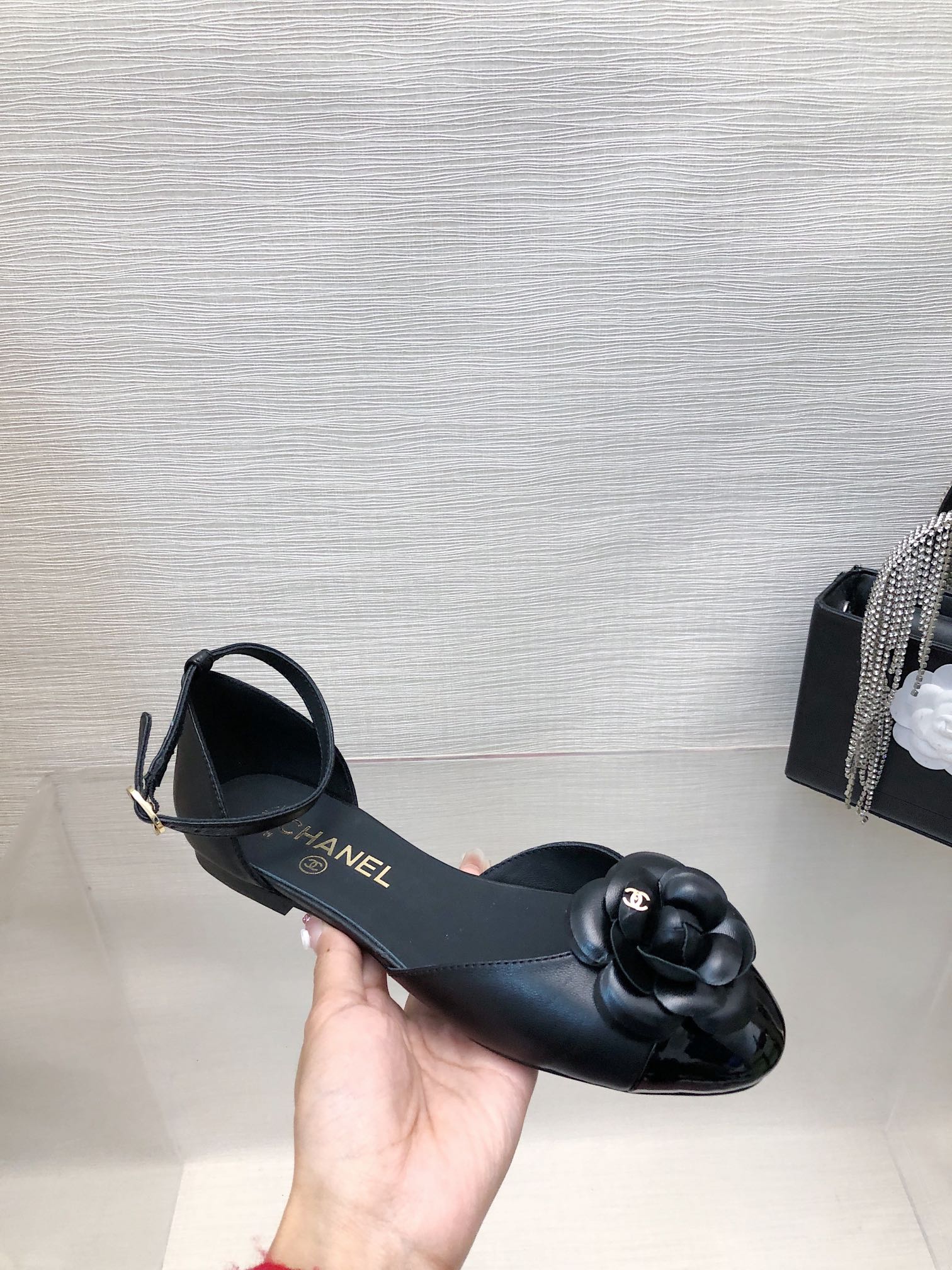 CHANEL BLACK LAMBSKIN CAMELLIA HOLLOW SANDAL
