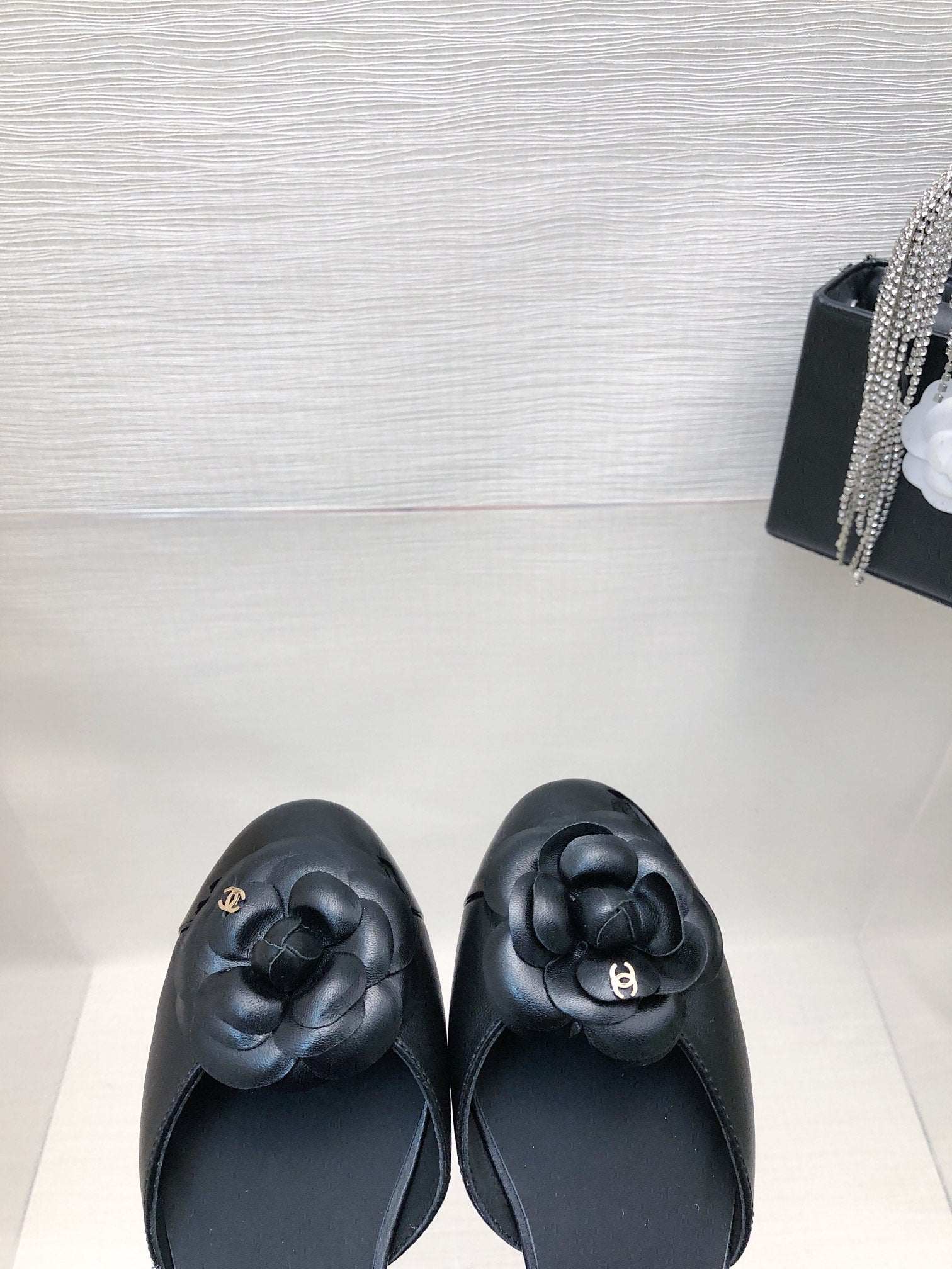 CHANEL BLACK LAMBSKIN CAMELLIA HOLLOW SANDAL