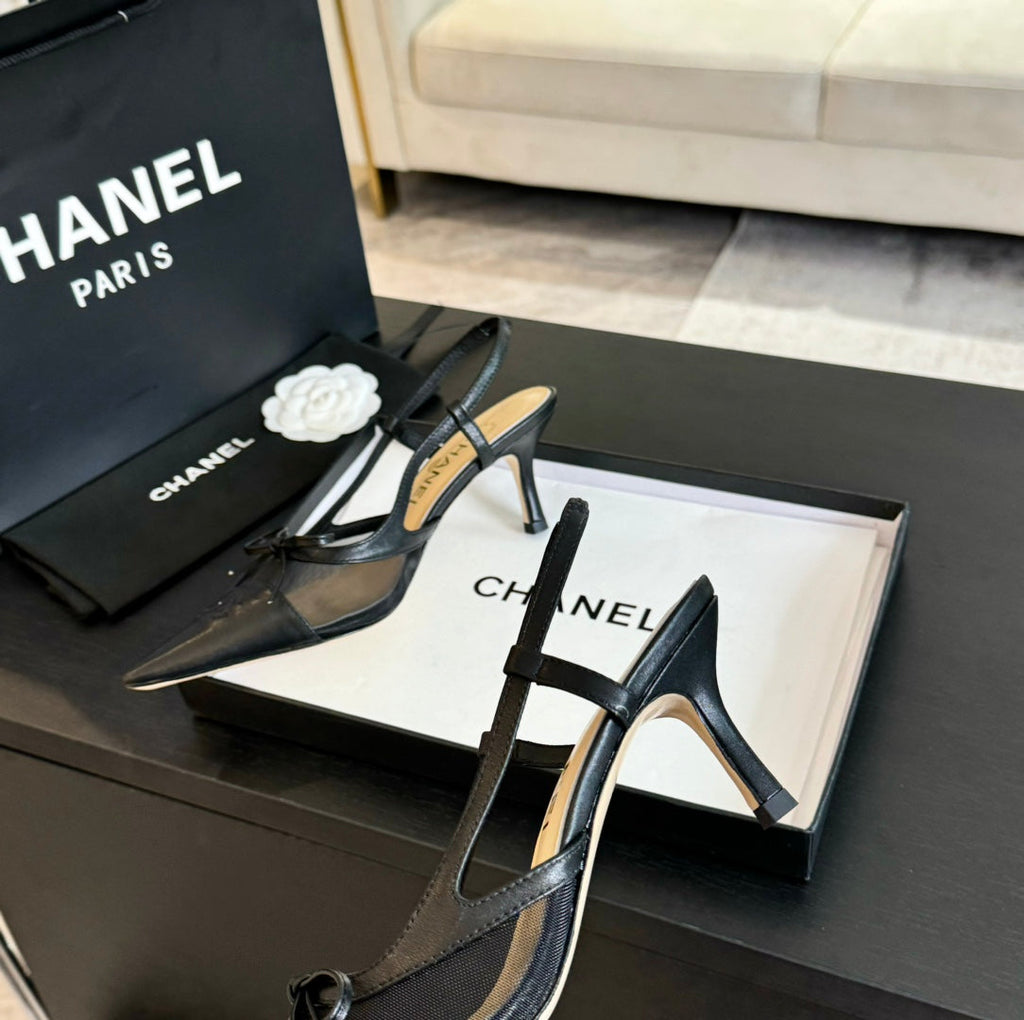 CHANEL MESH LOGO SLINGBACKS IN BLACK LAMBSKIN