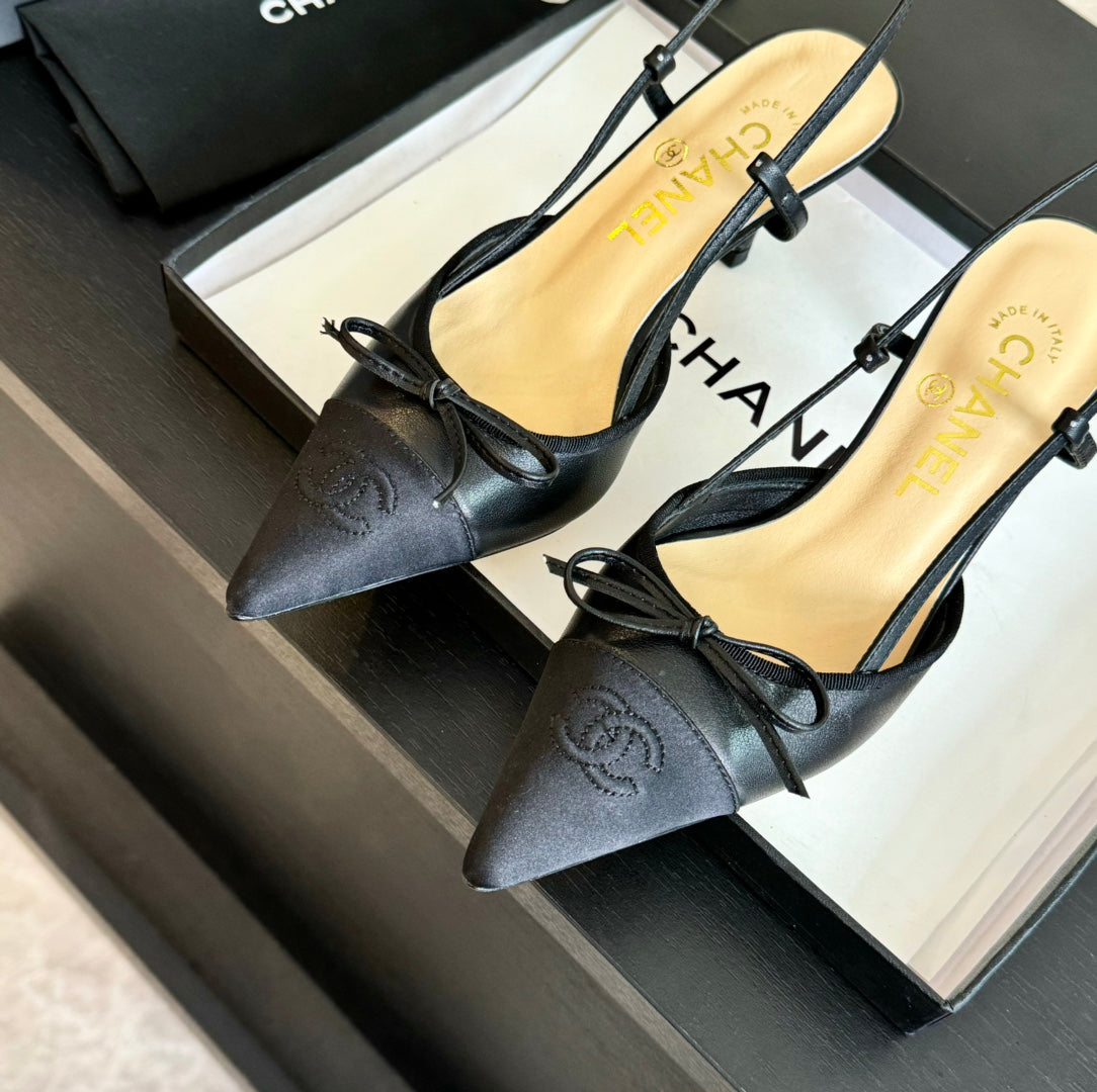 CHANEL SLINGBACK WITH BOW IN BLACK LAMBSKIN