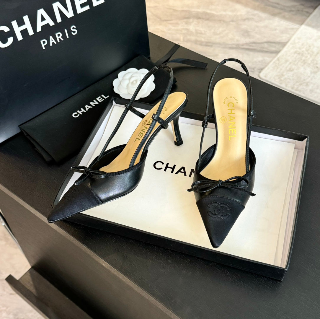 CHANEL SLINGBACK WITH BOW IN BLACK LAMBSKIN