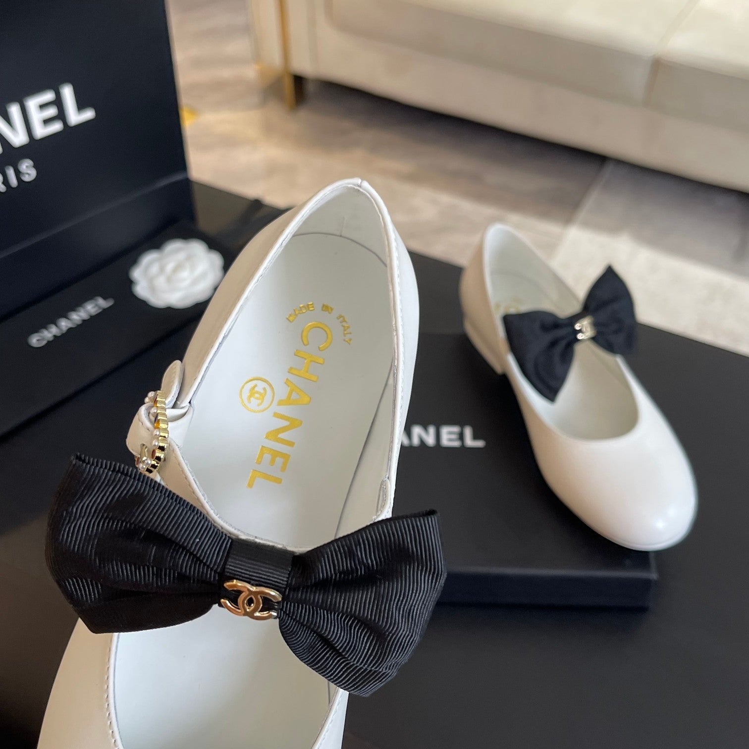 CHANEL BALLET FLAT WHITE LAMBSKIN WITH BLACK BOW