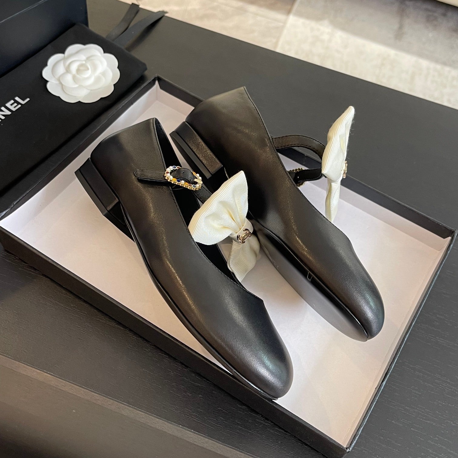 CHANEL BALLET FLAT BLACK LAMBSKIN WITH WHITE BOW