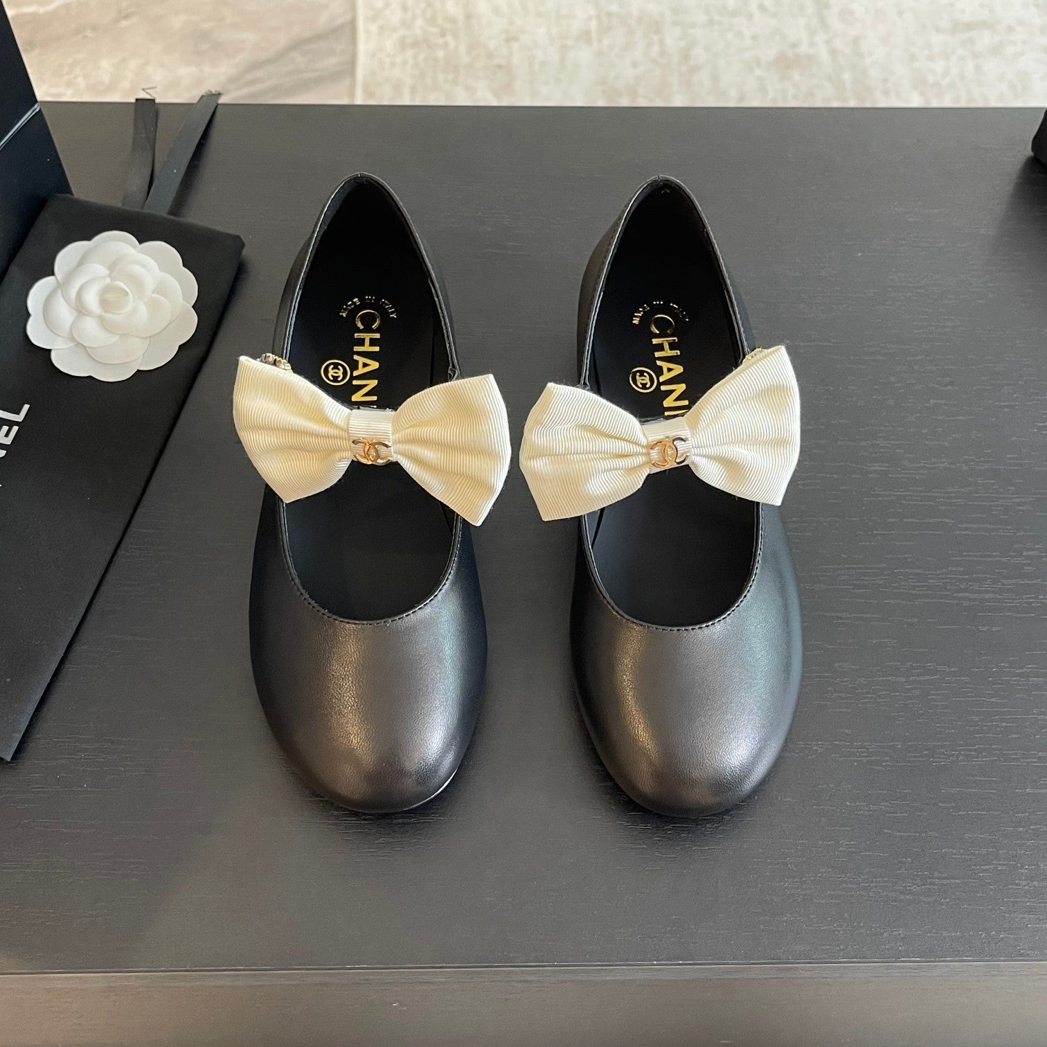 CHANEL BALLET FLAT BLACK LAMBSKIN WITH WHITE BOW