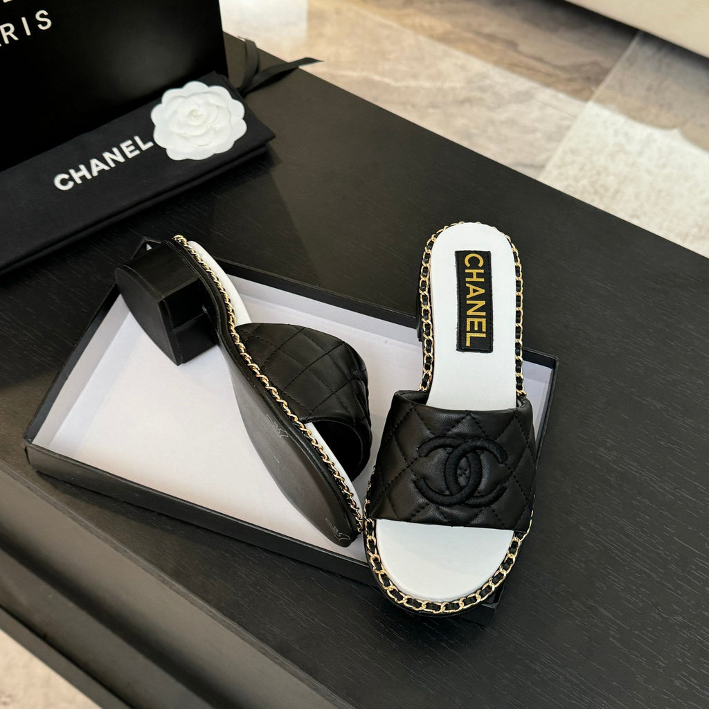CHANEL HIGH FLATFORM SLIPPER IN BLACK EMBOSSED SHEEPSKIN