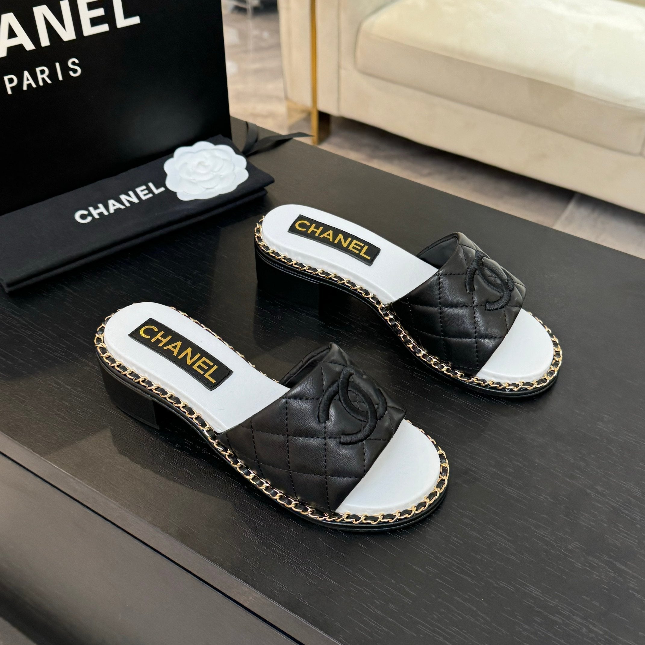 CHANEL HIGH FLATFORM SLIPPER IN BLACK EMBOSSED SHEEPSKIN