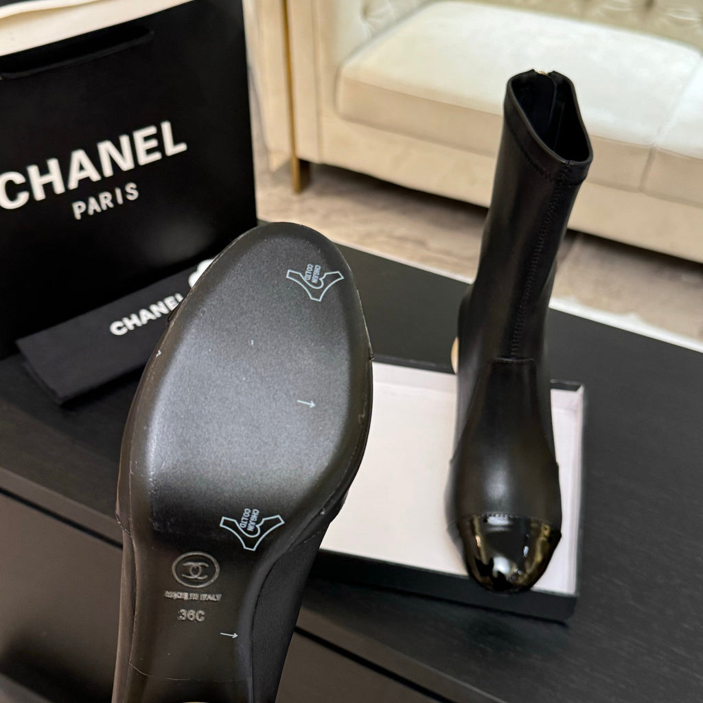 CHANEL PEARL BOOTS 65MM IN BLACK CALFSKIN