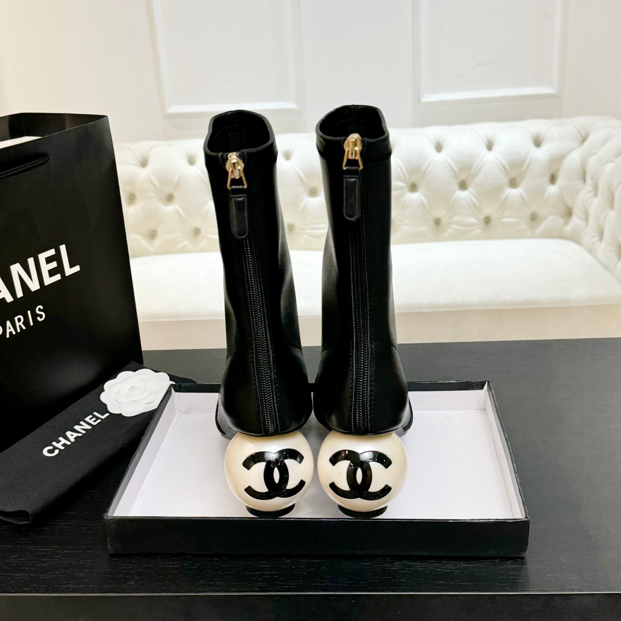 CHANEL PEARL BOOTS 65MM IN BLACK CALFSKIN