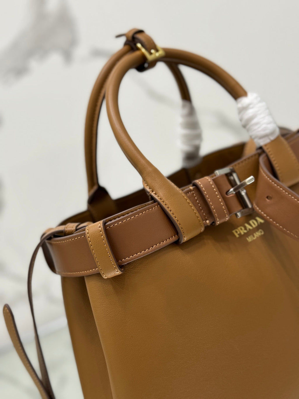 PRADA TOTE BAG WITH BELT 32 IN CIDER BROWN IMPORTED CALFSKIN