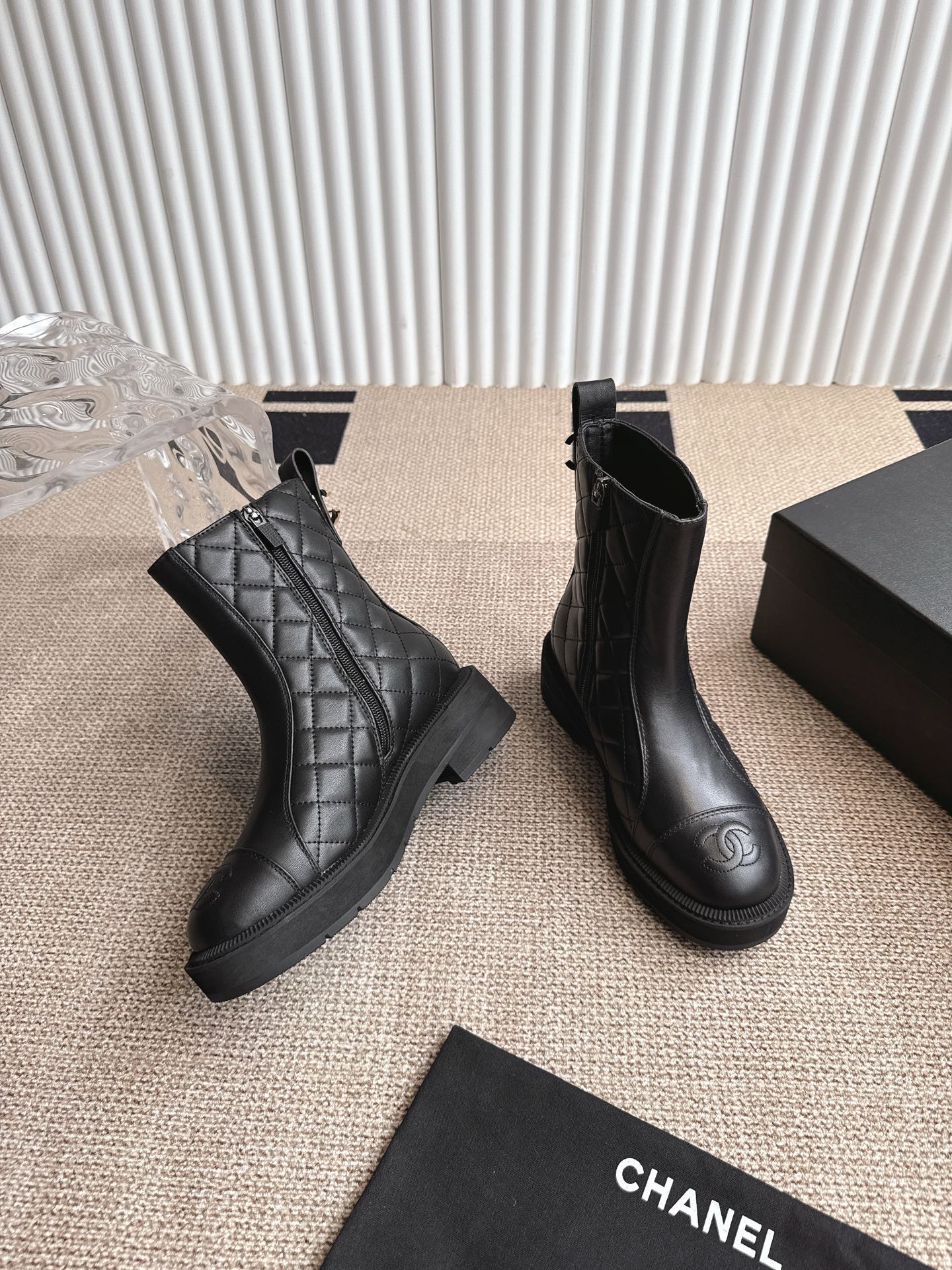 CHANEL ANKLE BOOTS IN BLACK QUILTED CALFSKIN