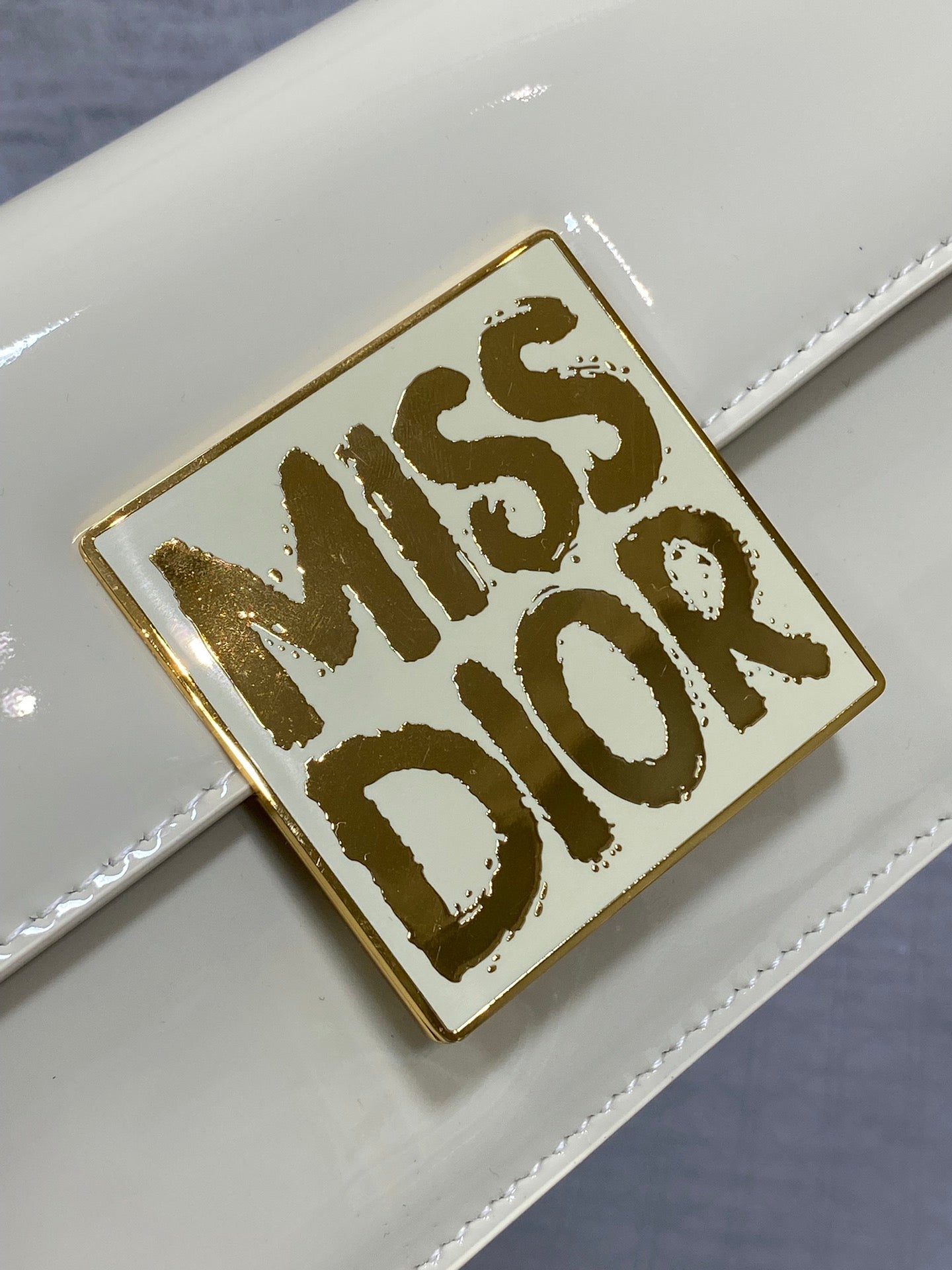 DIOR FLAP BAG 18 IN WHITE PATENT CALFSKIN