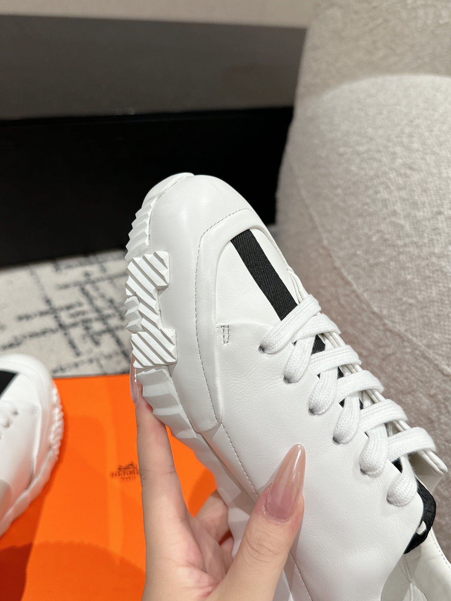 HERMES BOUNCING SNEAKER IN WHITE MIX BLACK CALFSKIN