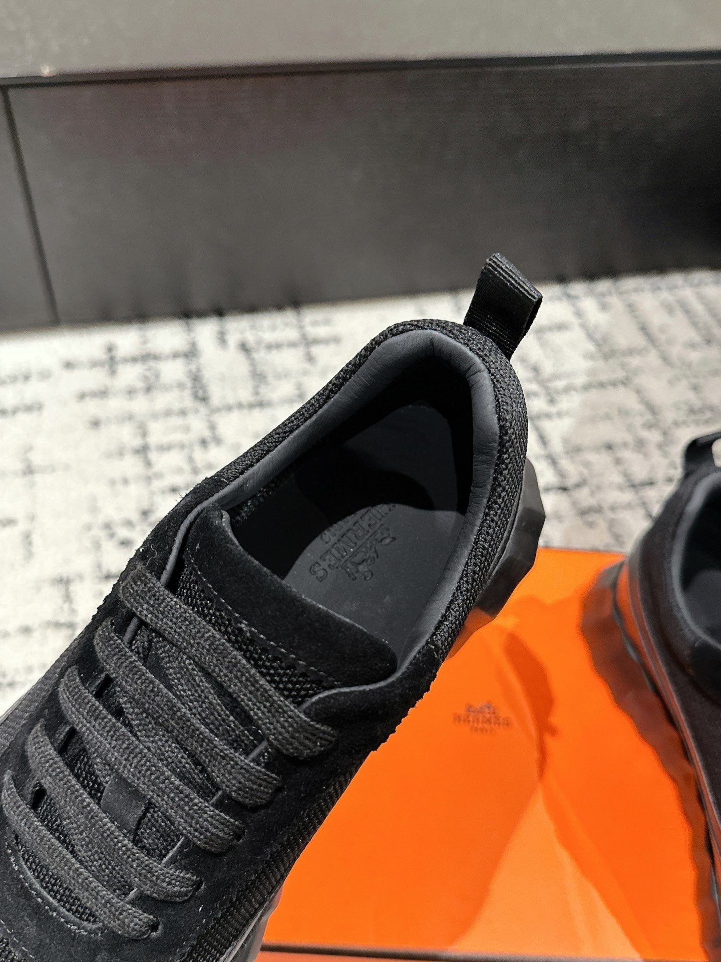 HERMES BOUNCING SNEAKER IN BLACK CALFSKIN AND FABRIC