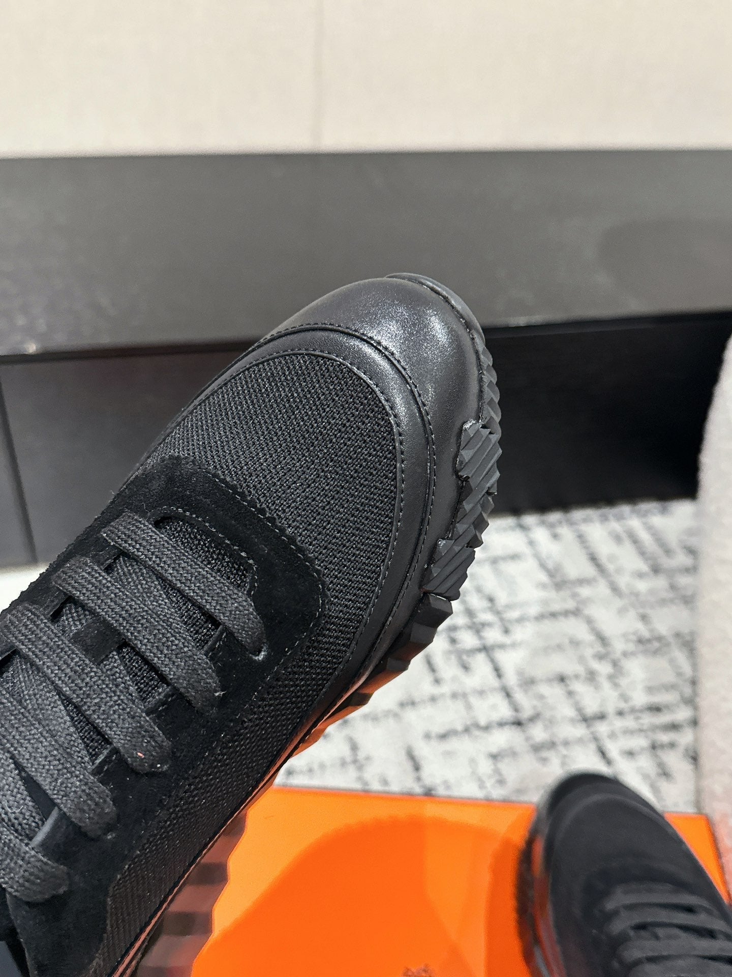 HERMES BOUNCING SNEAKER IN BLACK CALFSKIN AND FABRIC