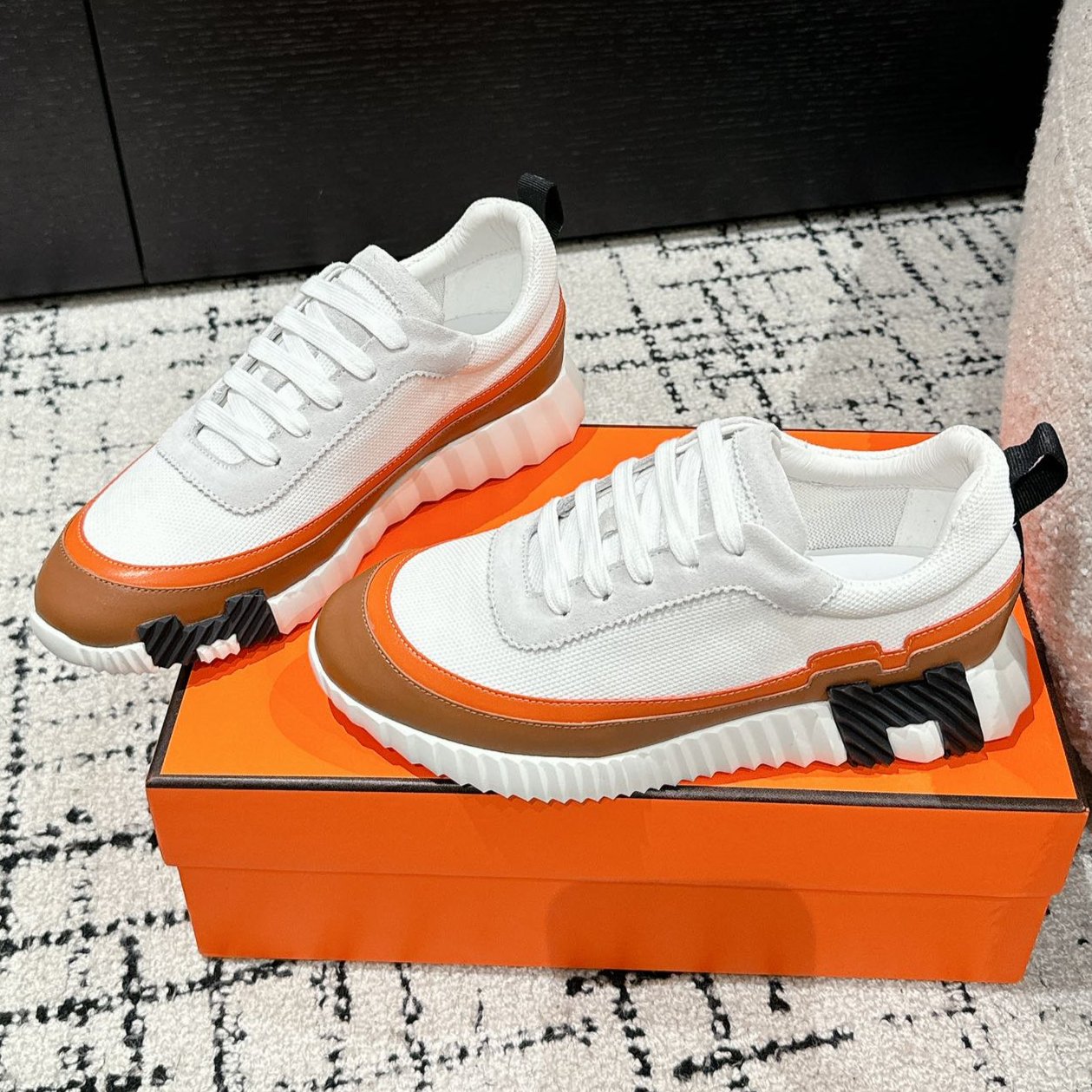 HERMES BOUNCING SNEAKER IN BRONZE BROWN CALFSKIN AND WHITE FABRIC