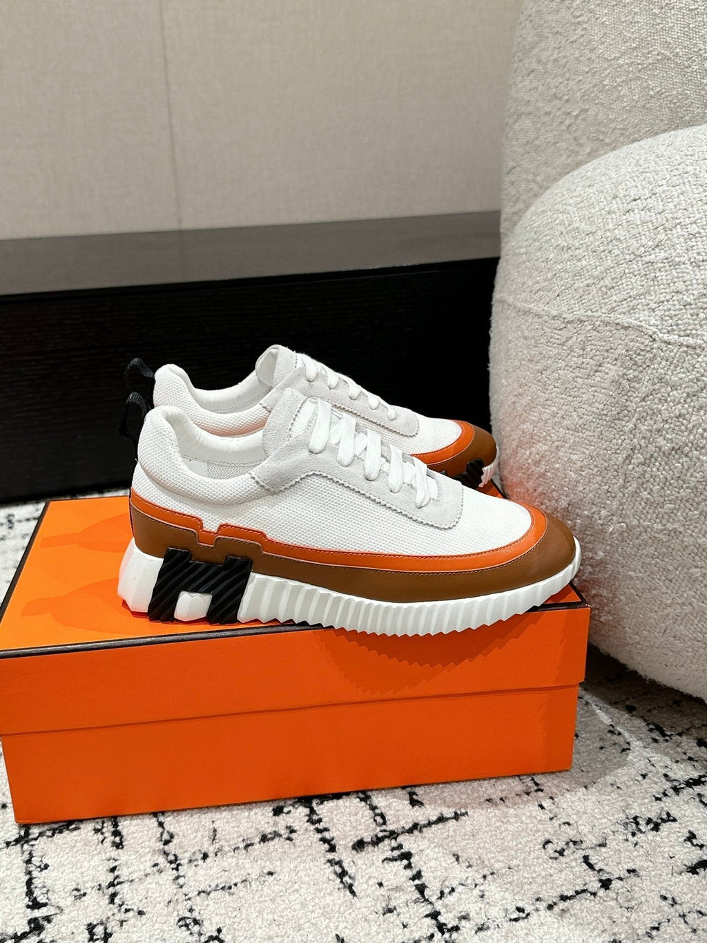 HERMES BOUNCING SNEAKER IN BRONZE BROWN CALFSKIN AND WHITE FABRIC