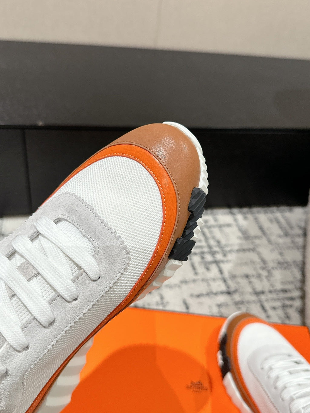 HERMES BOUNCING SNEAKER IN BRONZE BROWN CALFSKIN AND WHITE FABRIC
