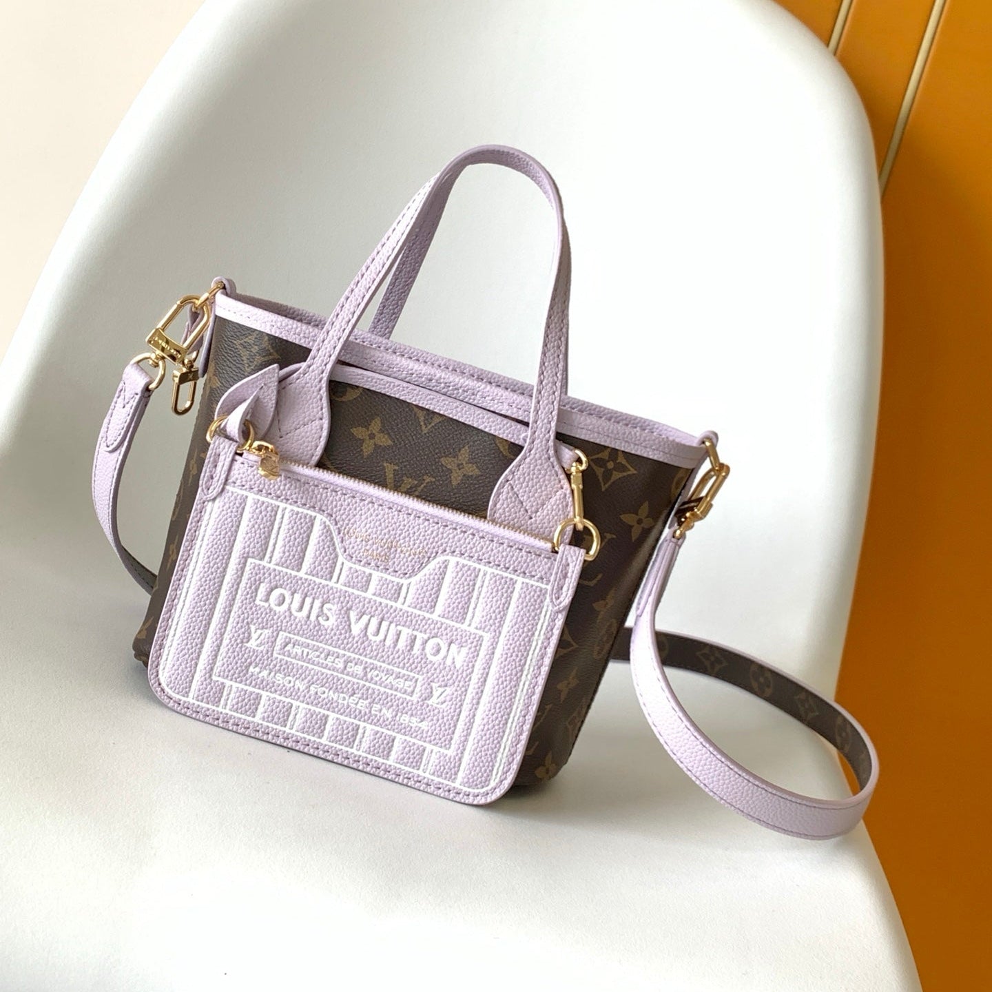 LOUIS VUITTON LV 25S NEVERFULL BANDOULIÈRE INSIDE OUT BB 24 IN LIGHT PURPLE AND BROWN CALFSKIN