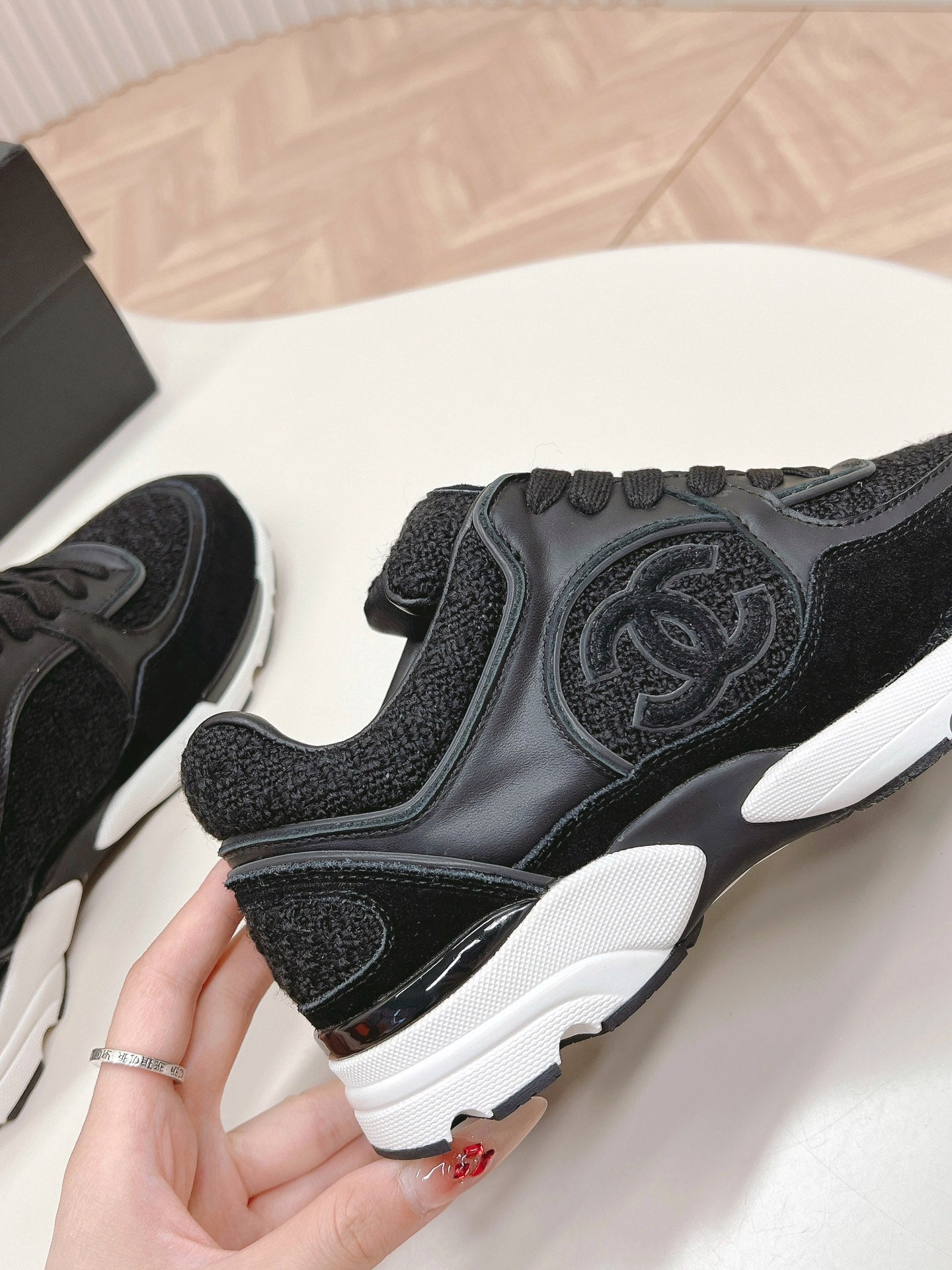 CHANEL TRAINERS IN BLACK SUEDE AND CALFSKIN