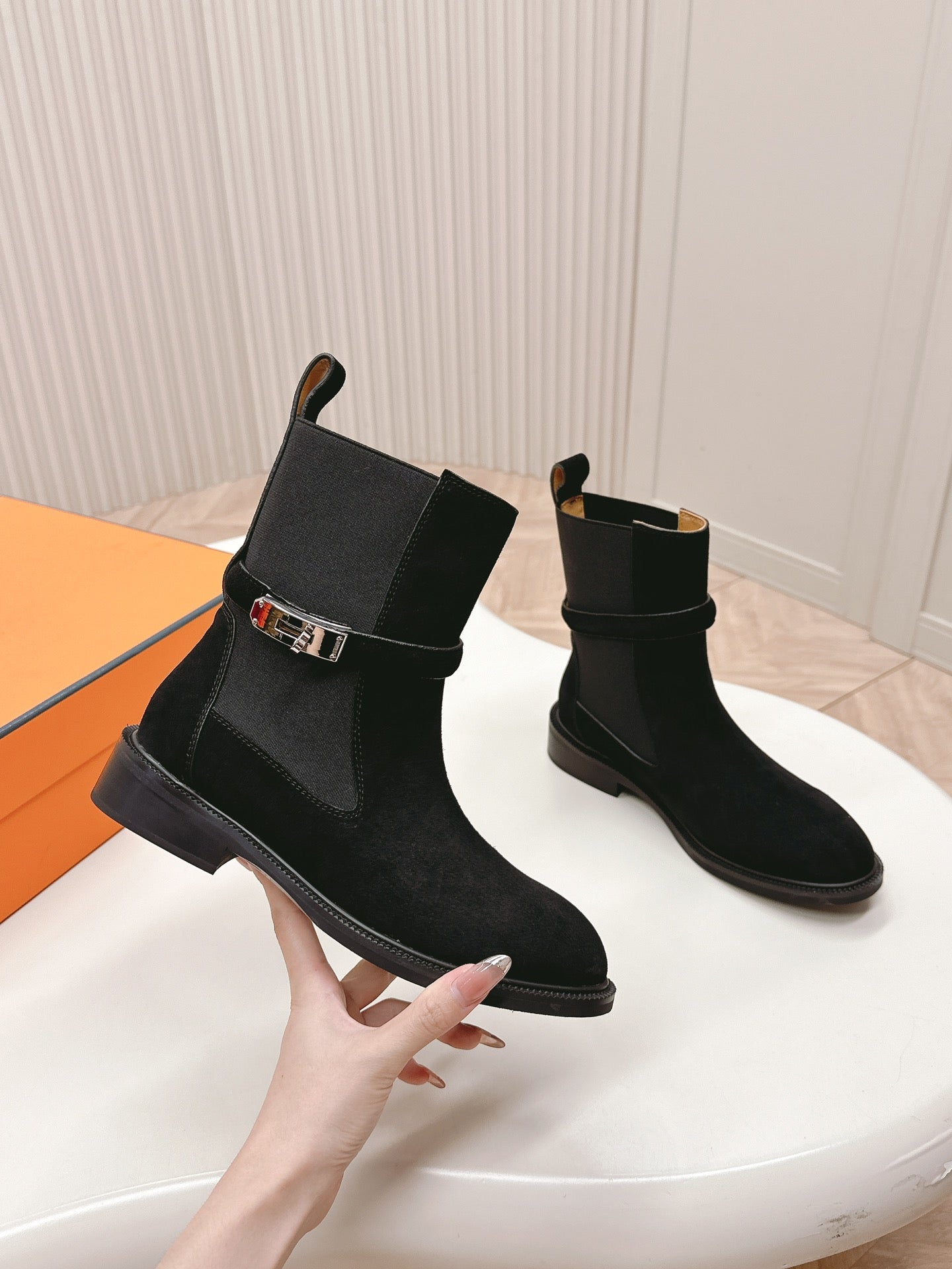 HERMES KELLY BUCKLE SHORT BOOTS IN BLACK SUEDE