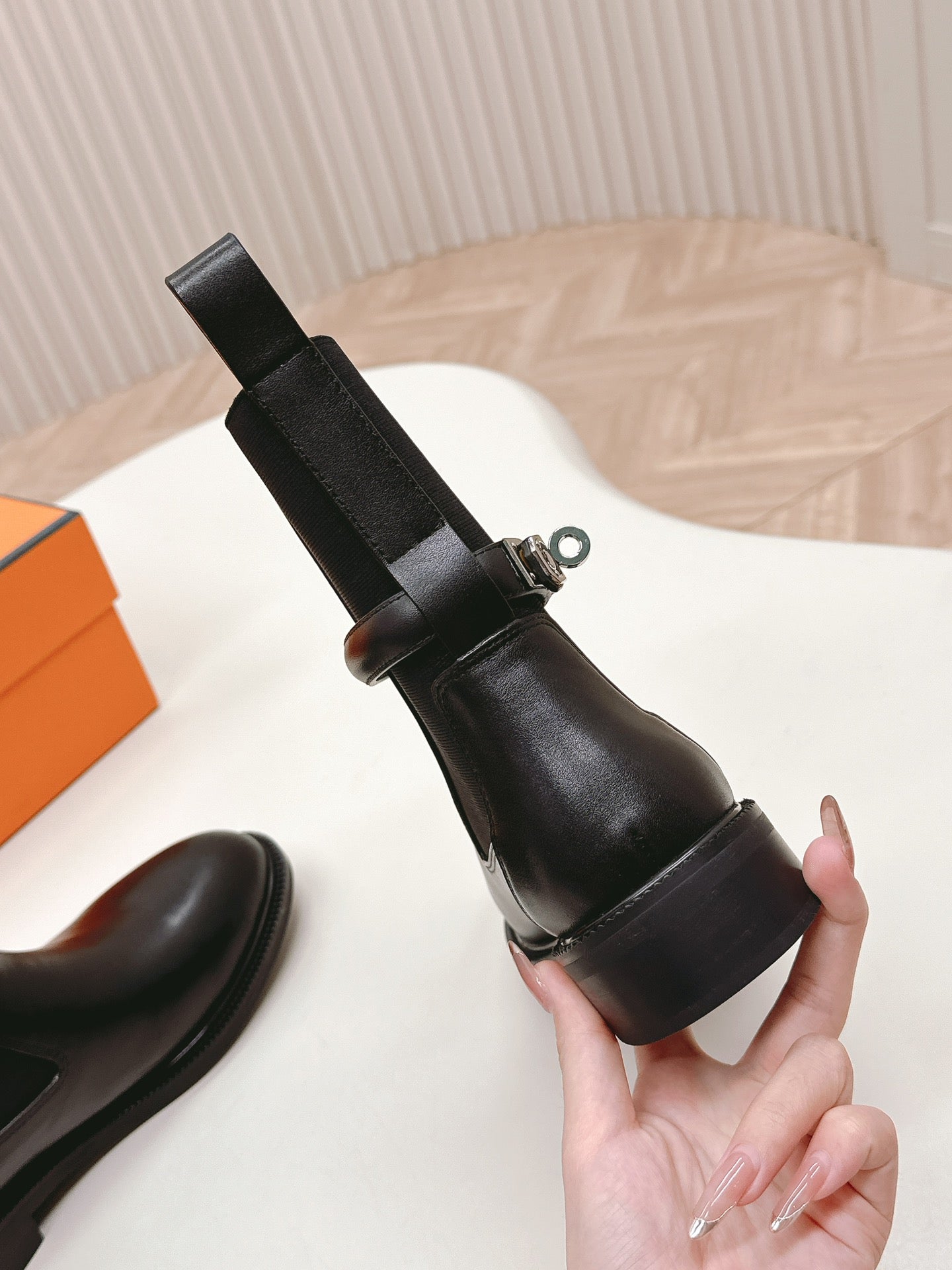 HERMES KELLY BUCKLE SHORT BOOTS IN BLACK CALFSKIN