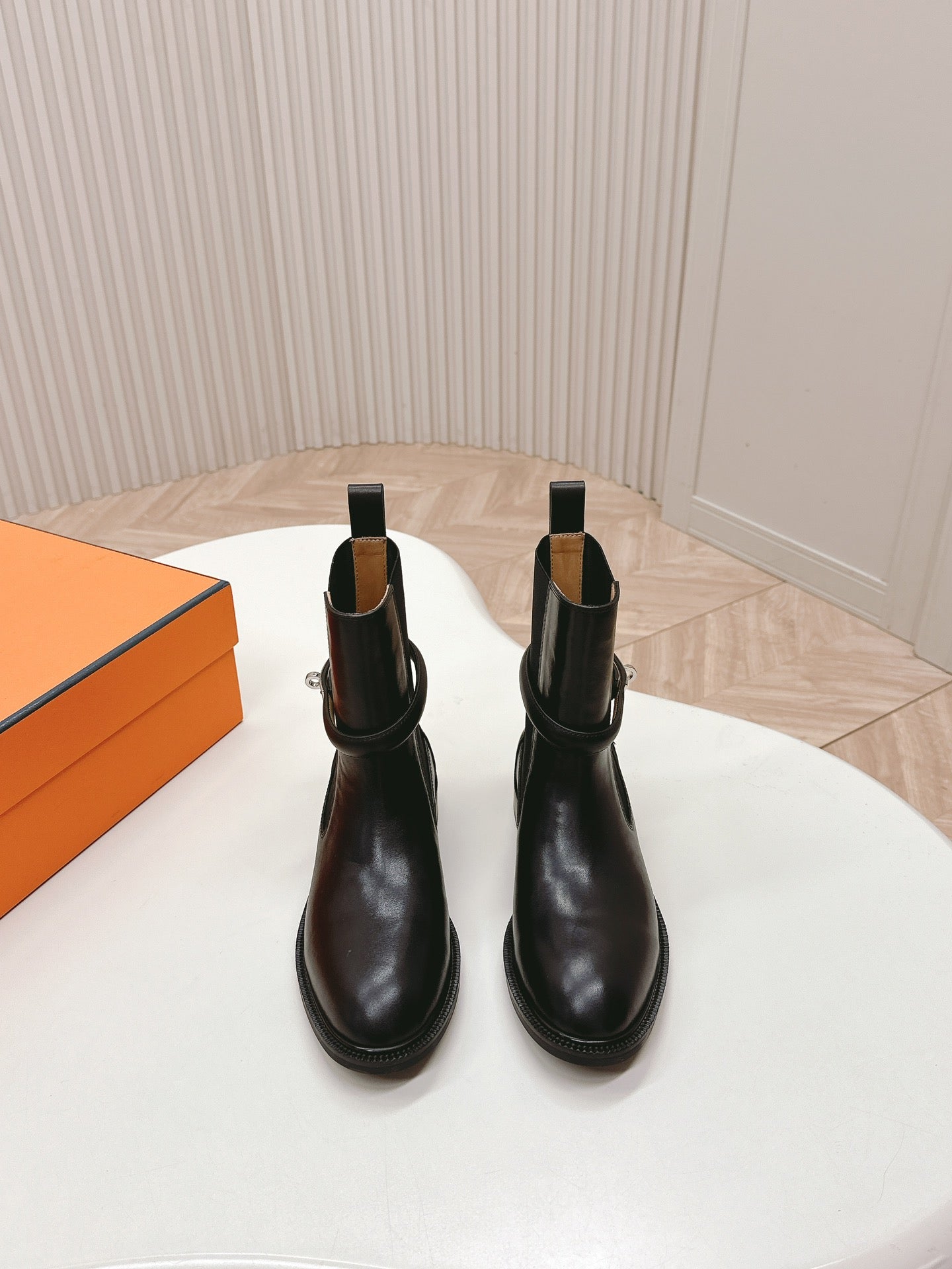 HERMES KELLY BUCKLE SHORT BOOTS IN BLACK CALFSKIN