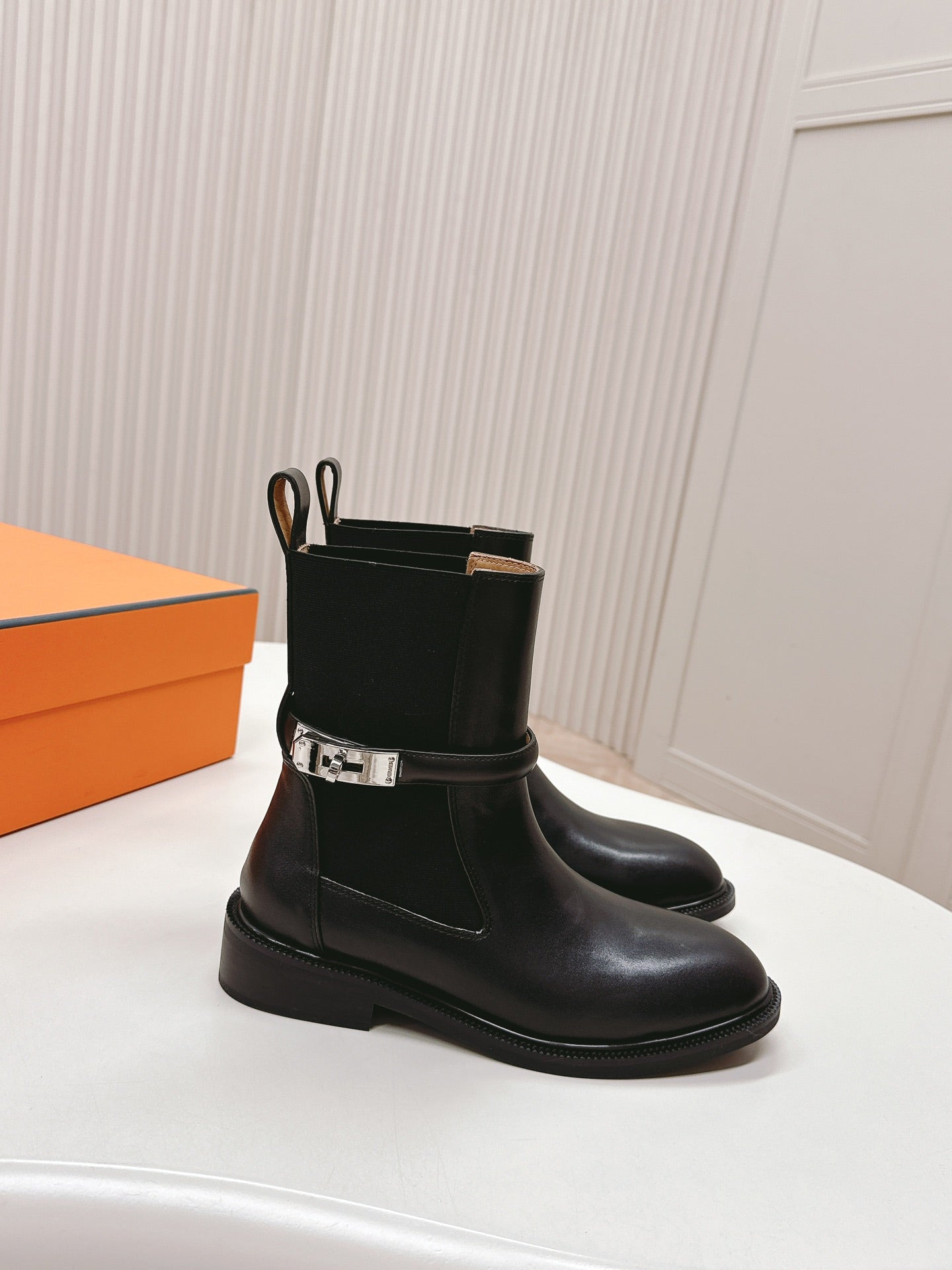 HERMES KELLY BUCKLE SHORT BOOTS IN BLACK CALFSKIN