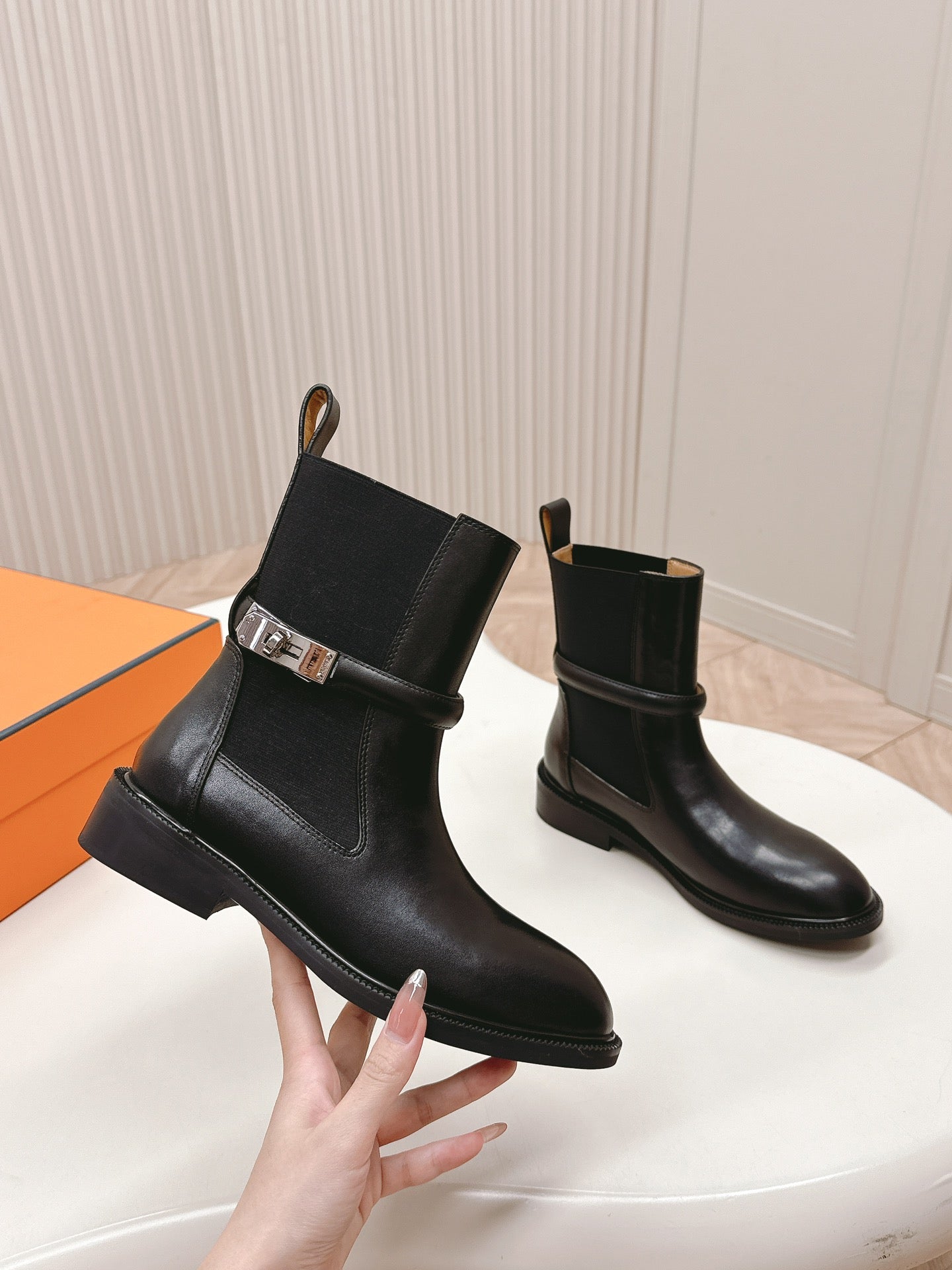 HERMES KELLY BUCKLE SHORT BOOTS IN BLACK CALFSKIN
