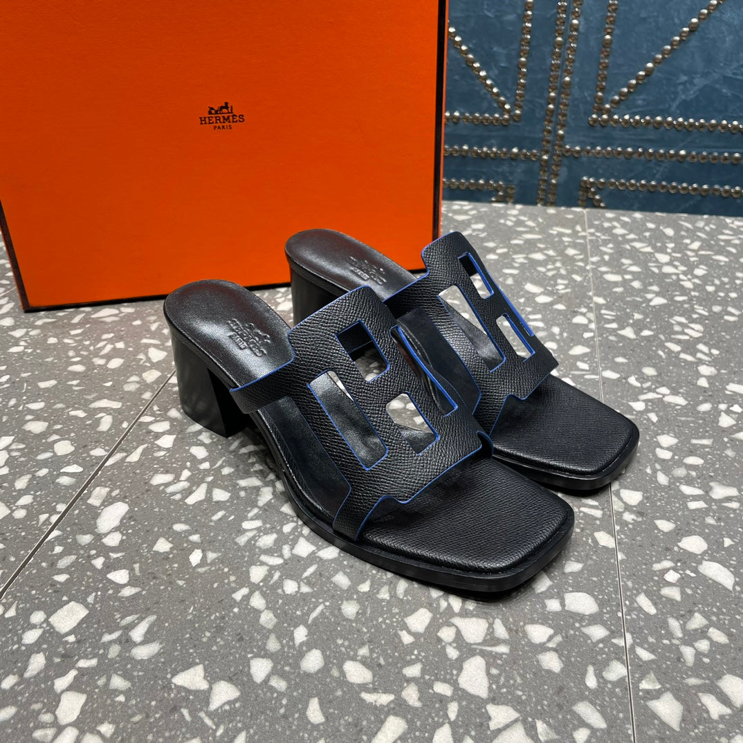 HERMES IZZY 50 MM SANDAL IN BLACK SHEEPSKIN