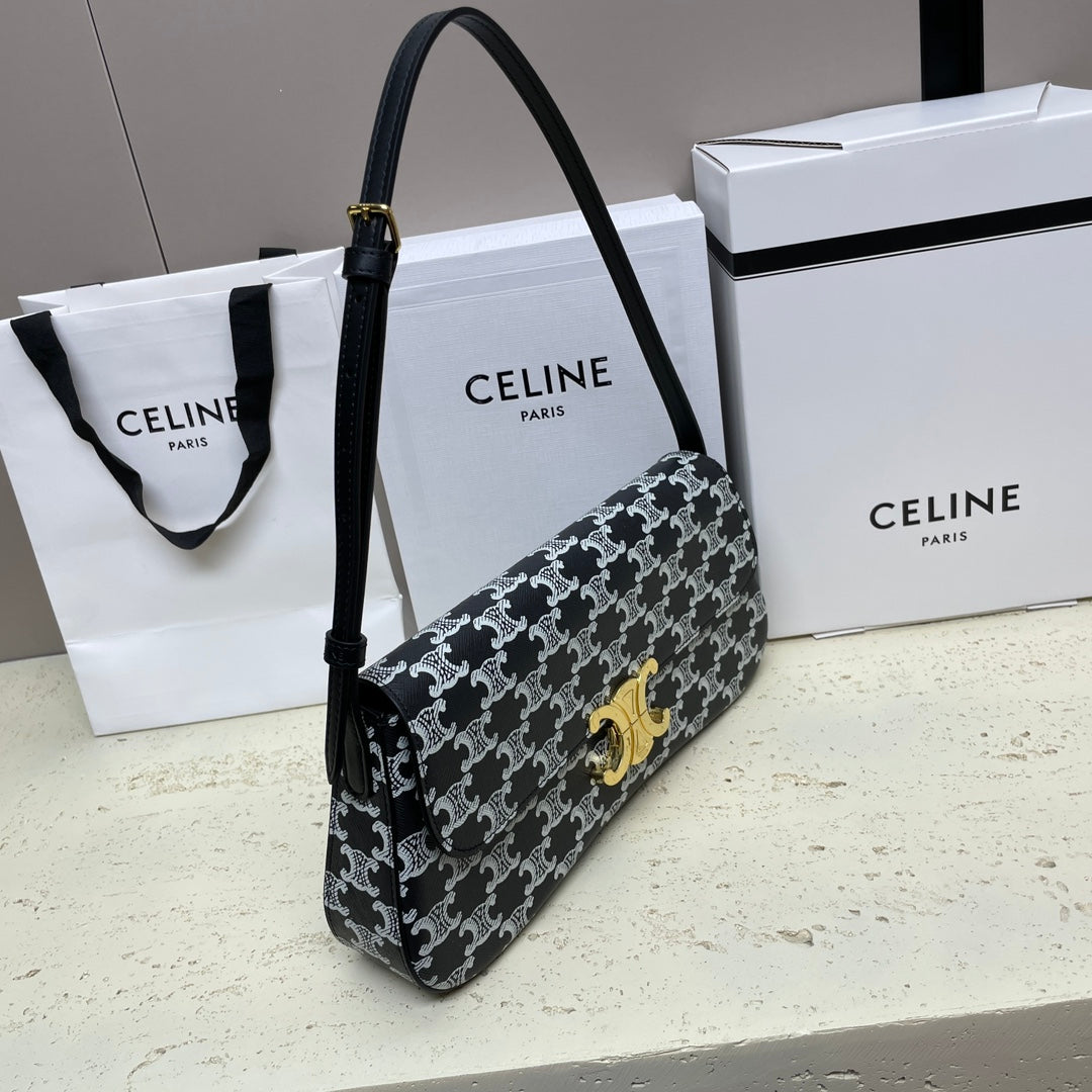 CELINE LOLA BAGUETTE BAG 28 IN BLACK MIX WHITE MONOGRAM CANVAS AND CALFSKIN