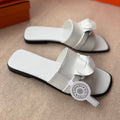 HERMES 0RAN SANDALS IN WHITE CALFSKIN