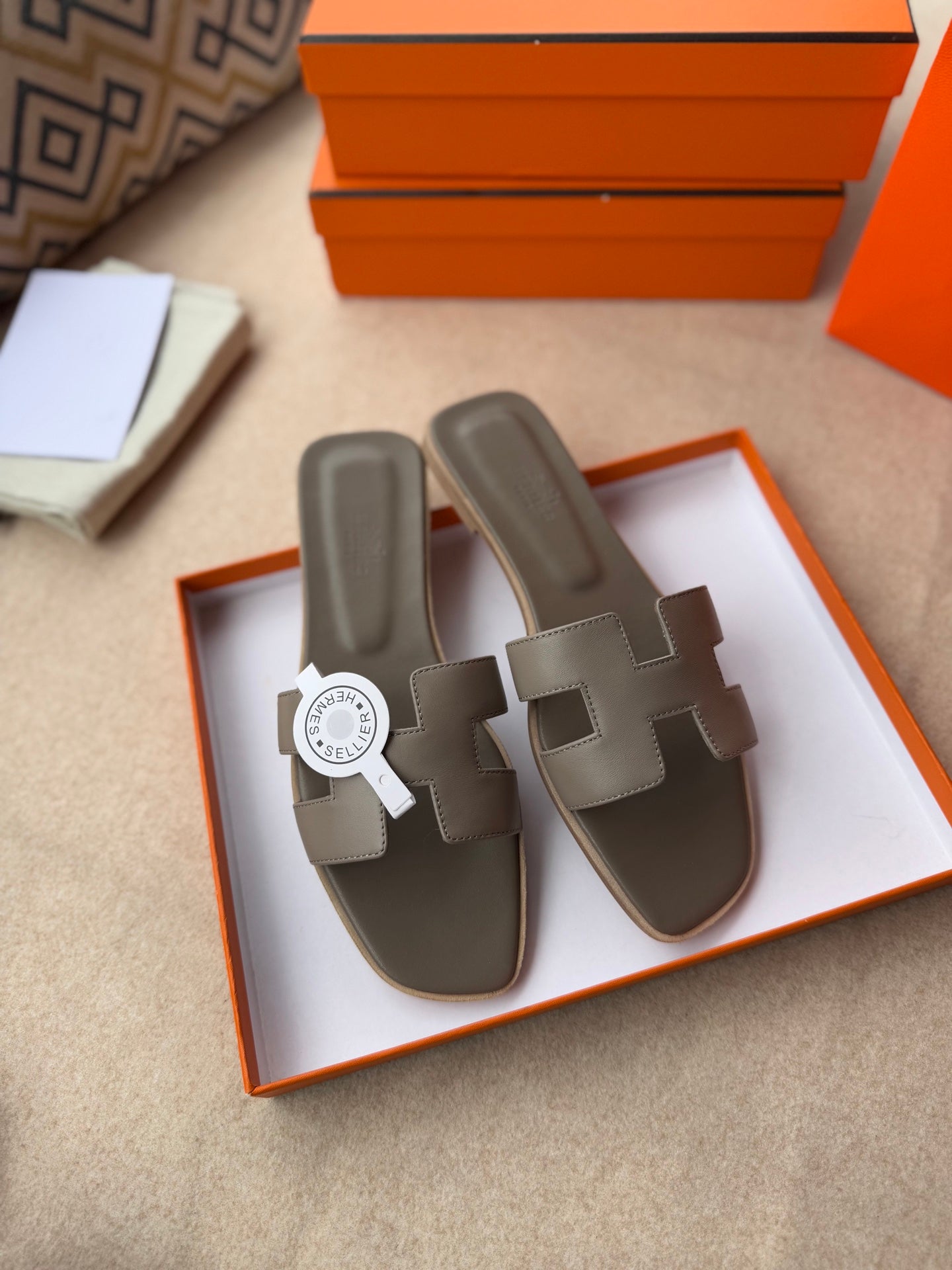 HERMES 0RAN SANDALS IN CEDAR BROWN CALFSKIN