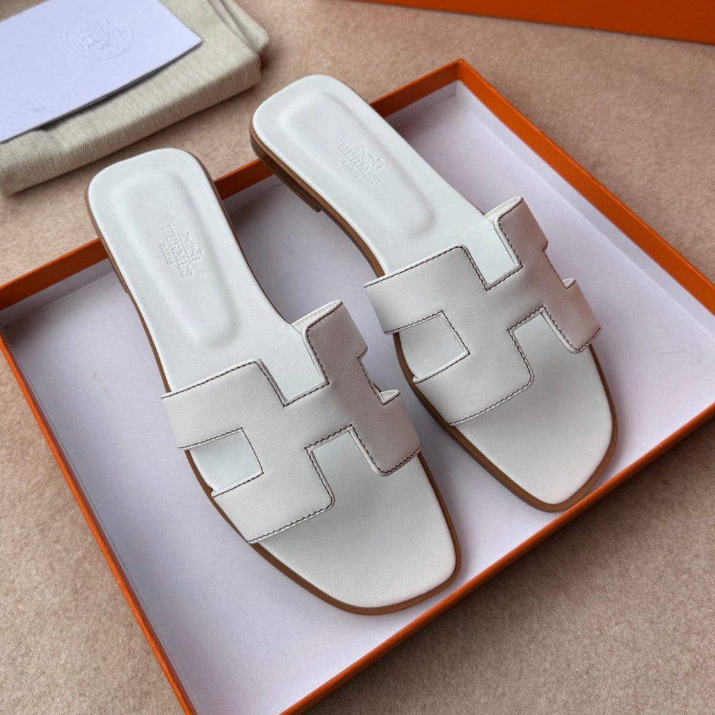 HERMES 0RAN SANDALS IN WHITE CALFSKIN