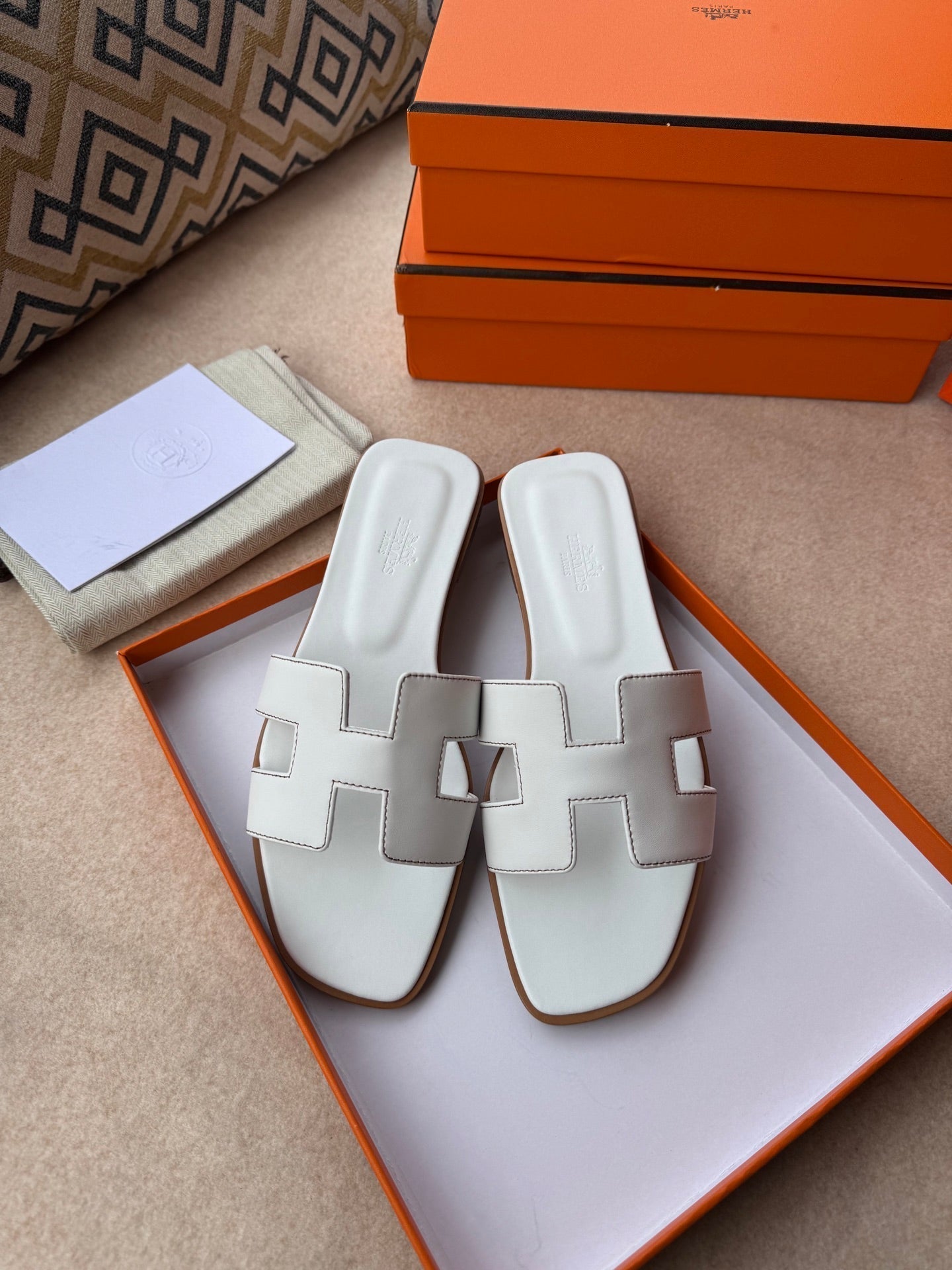 HERMES 0RAN SANDALS IN WHITE CALFSKIN