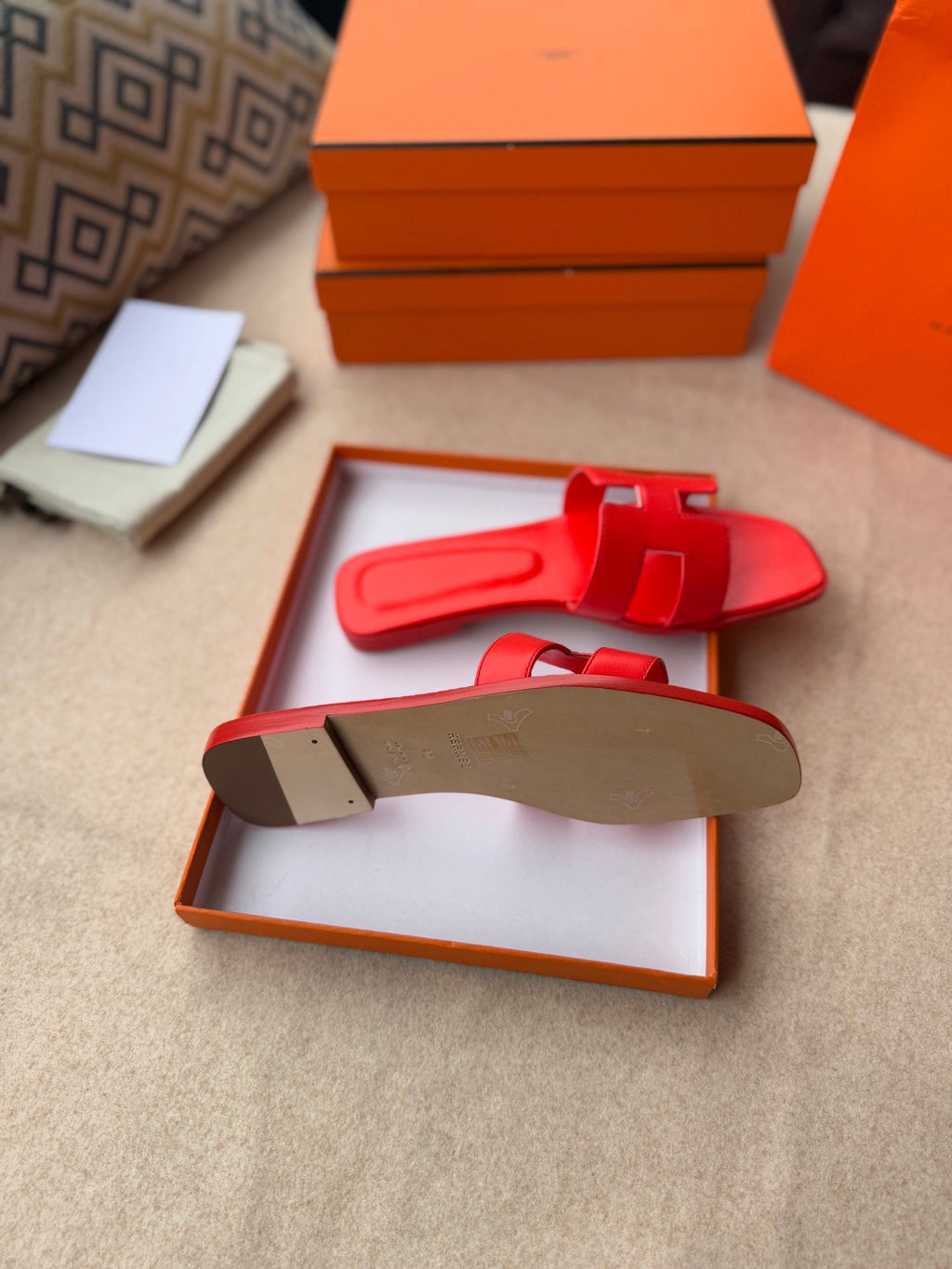 HERMES 0RAN SANDALS IN CHERRY RED CALFSKIN