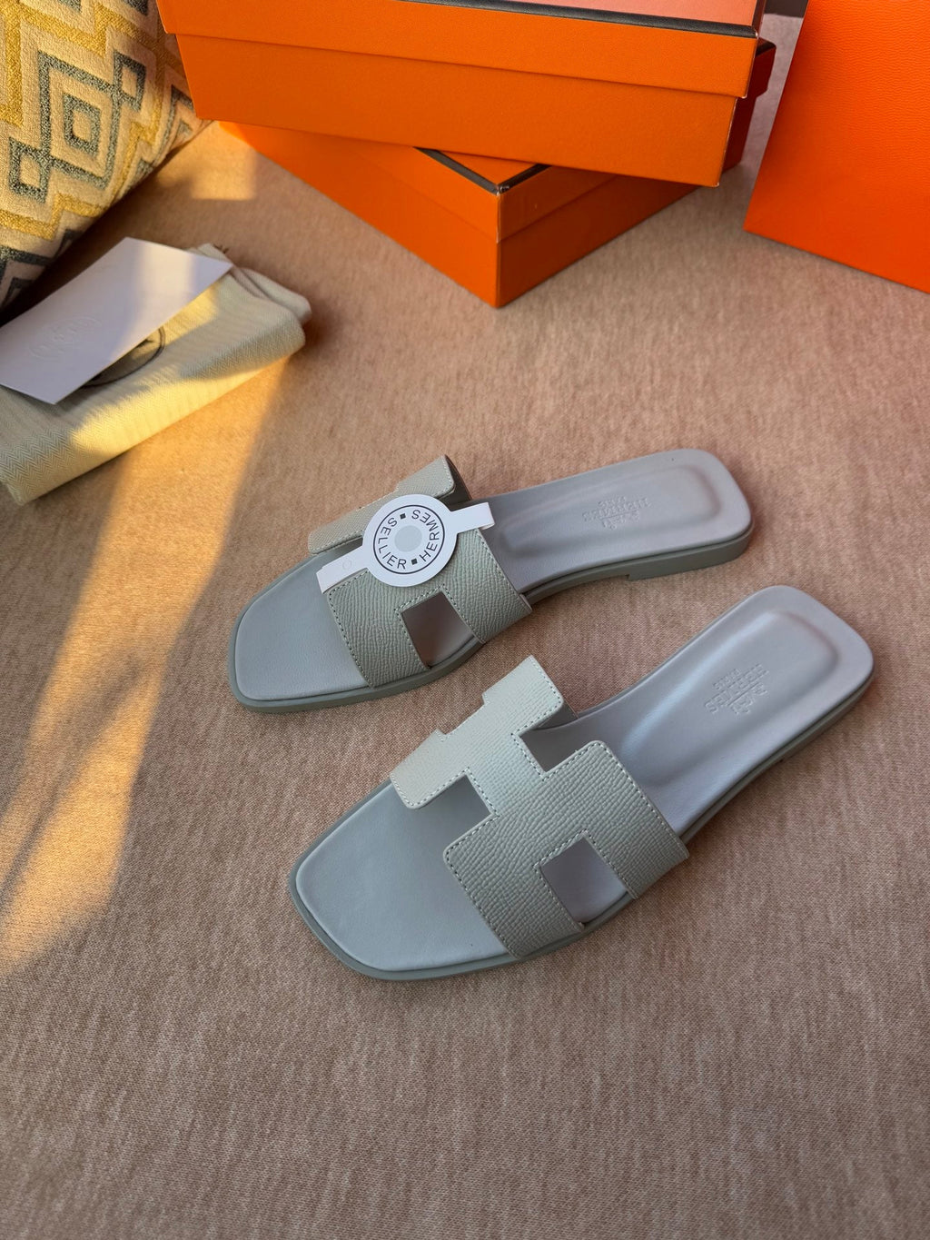 HERMES 0RAN SANDALS IN WARM GRAY CALFSKIN