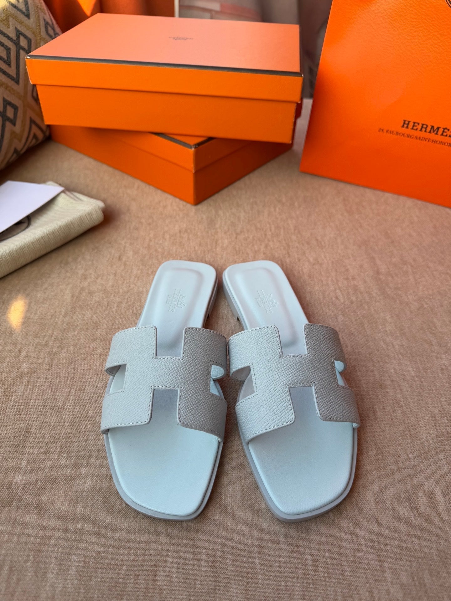 HERMES 0RAN SANDALS IN ICE BLUE CALFSKIN