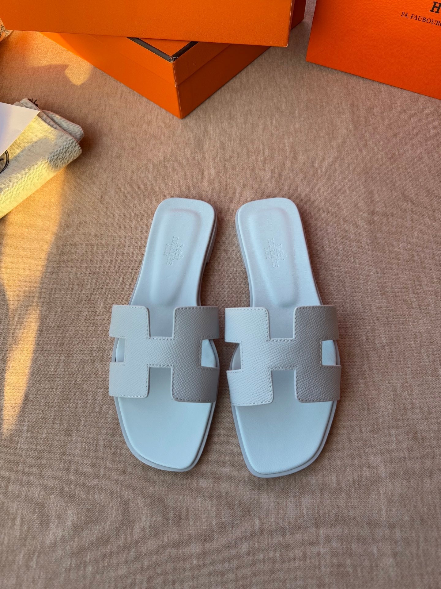 HERMES 0RAN SANDALS IN ICE BLUE CALFSKIN