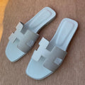 HERMES 0RAN SANDALS IN ICE BLUE CALFSKIN
