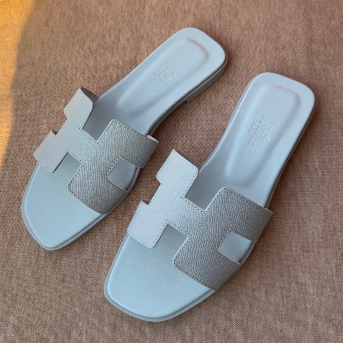 HERMES 0RAN SANDALS IN ICE BLUE CALFSKIN