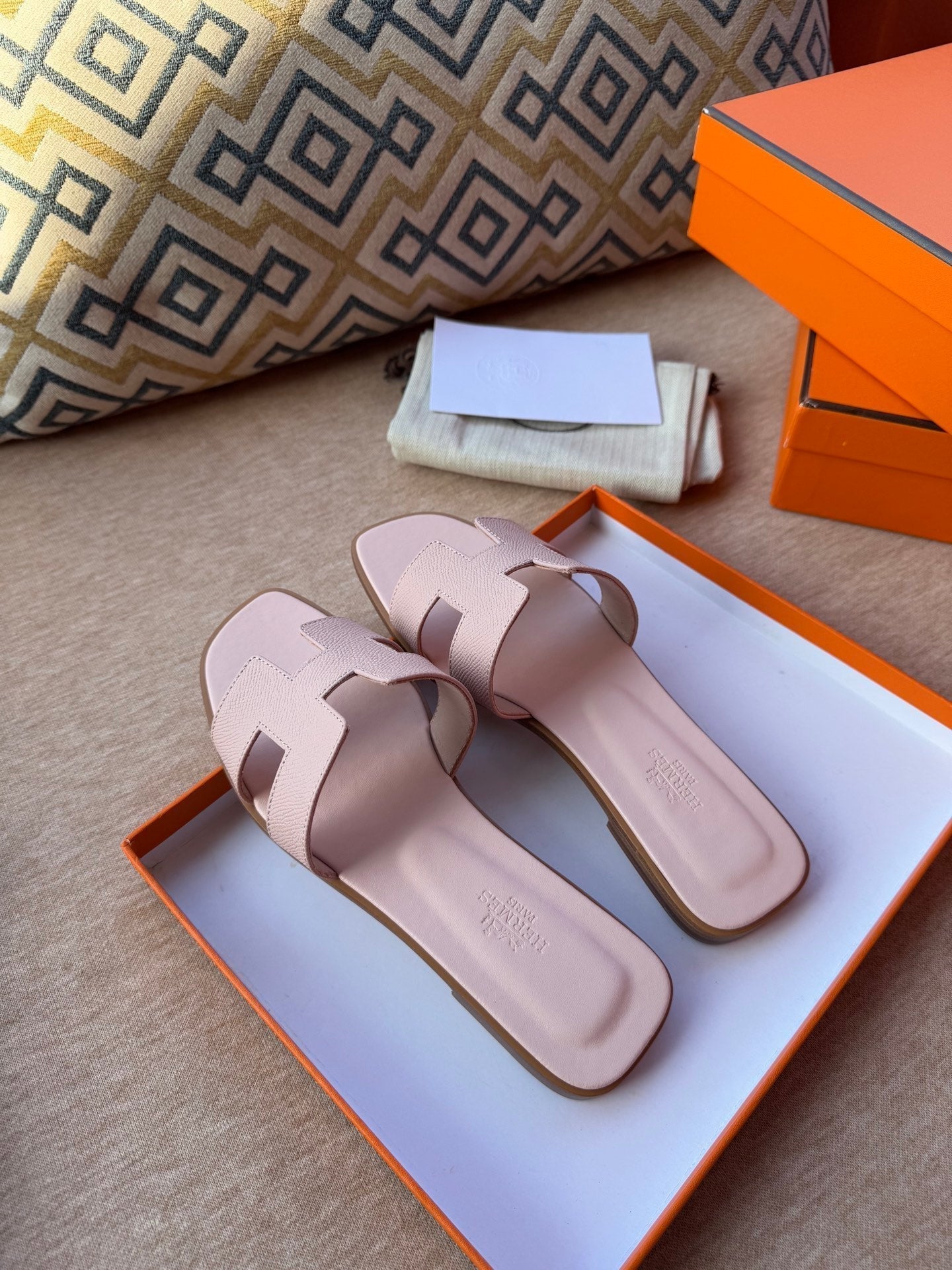 HERMES 0RAN SANDALS IN PASTEL PINK CALFSKIN